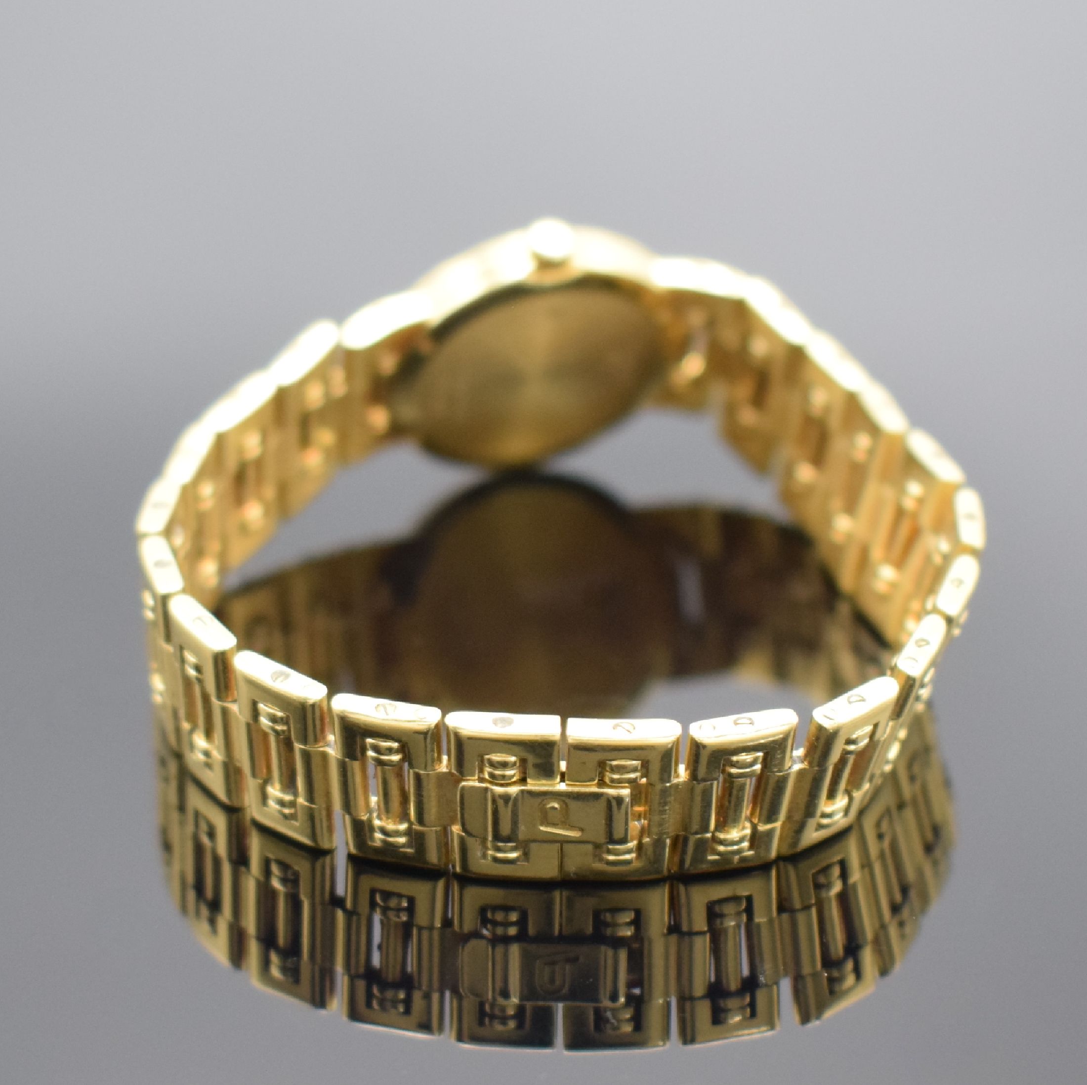 Detail b: PIAGET Damenarmbanduhr in GG 750/000 Referenz 80563 K81, Schweiz um 1990, quarz, Boden 4- fach verschr., champagnerfarb. Zifferbl. m. gold. Std.-Ind. ...