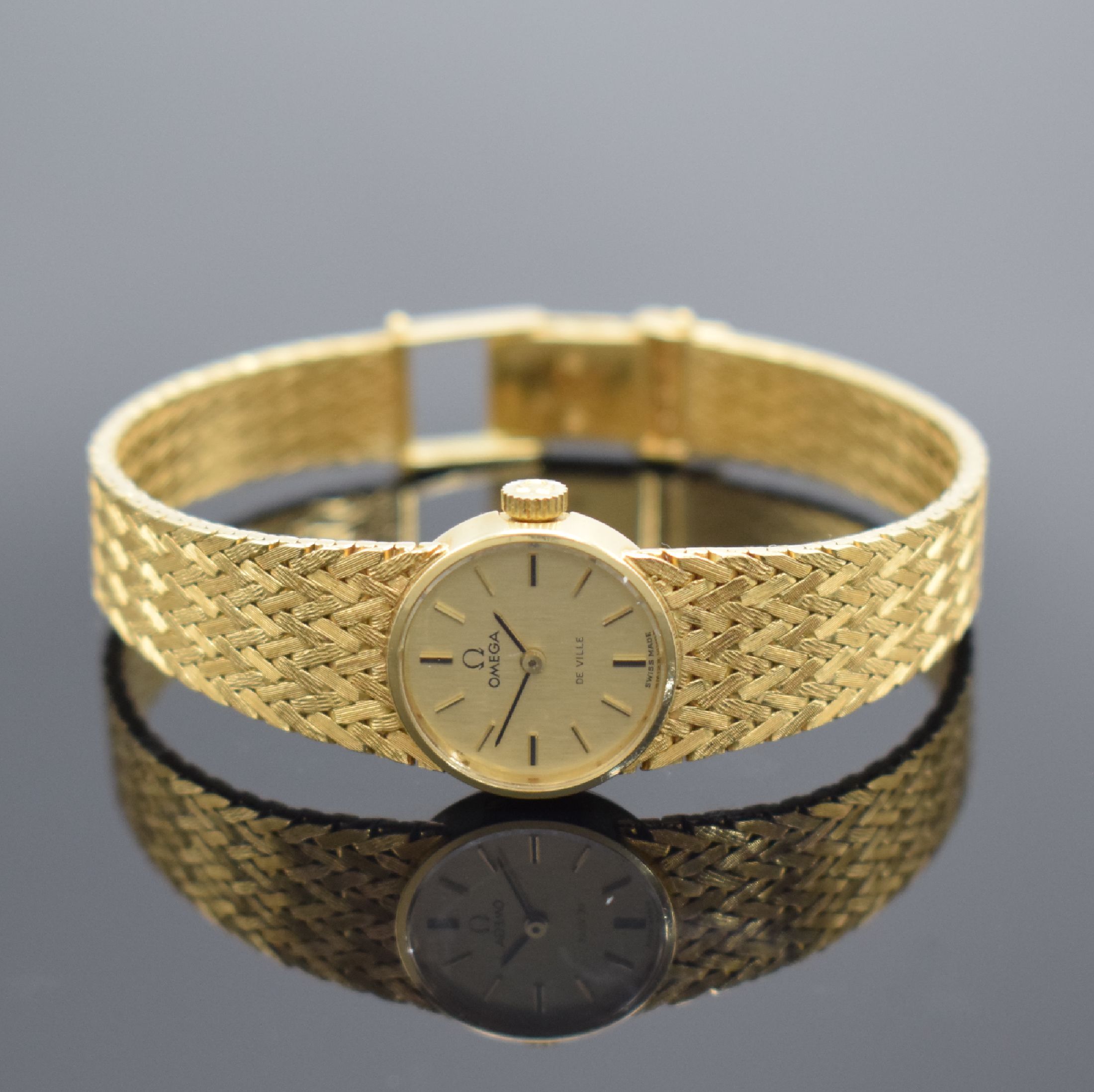 OMEGA De Ville Damenarmbanduhr in GG 750/000 mit GG 750/000 Milanaiseband Referenz 7254, Schweiz um 1970, Handaufzug, 2-teil. Geh., Boden aufgedr., ...
