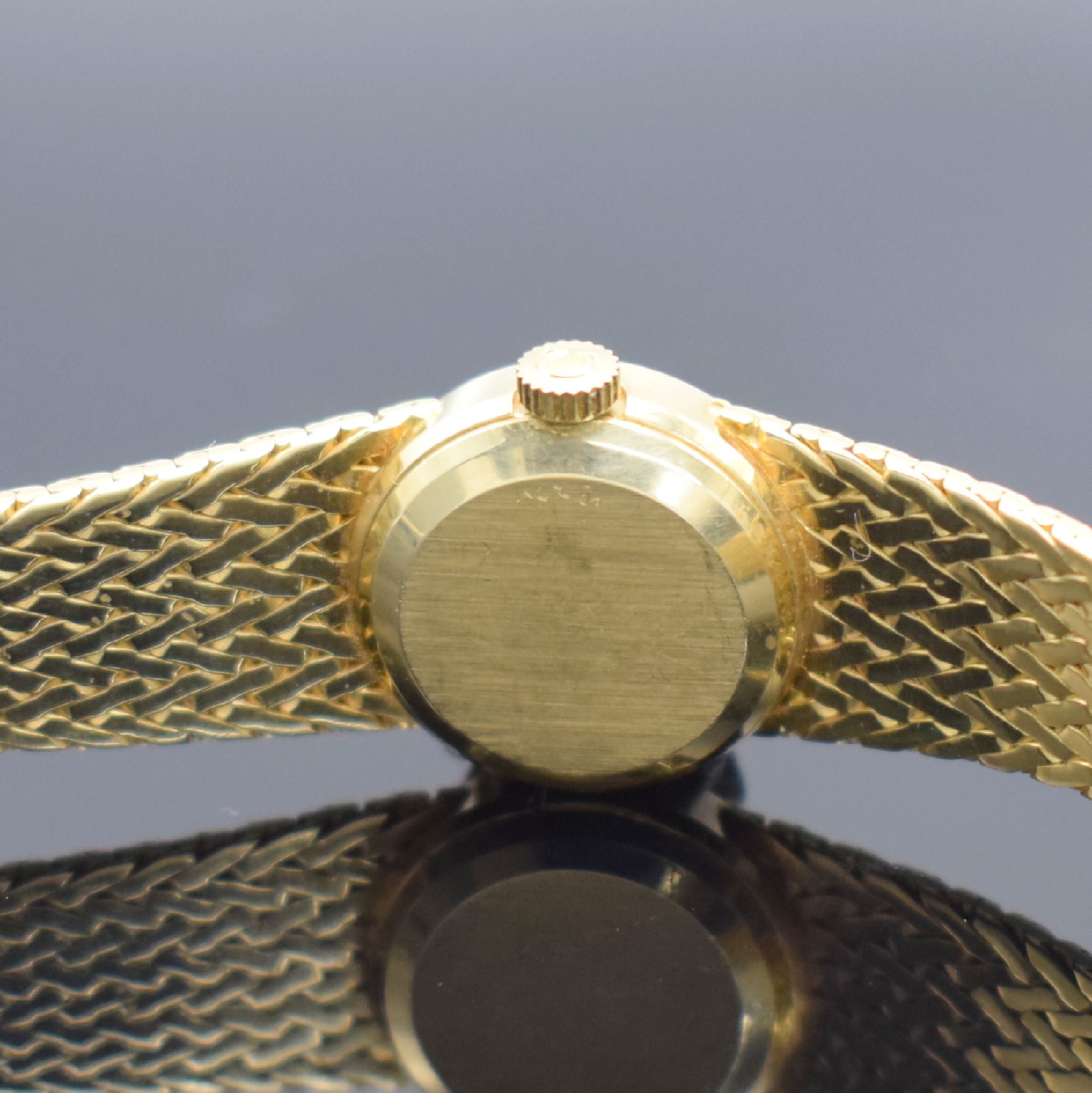 Detail e: OMEGA De Ville Damenarmbanduhr in GG 750/000 mit GG 750/000 Milanaiseband Referenz 7254, Schweiz um 1970, Handaufzug, 2-teil. Geh., Boden aufgedr., ...
