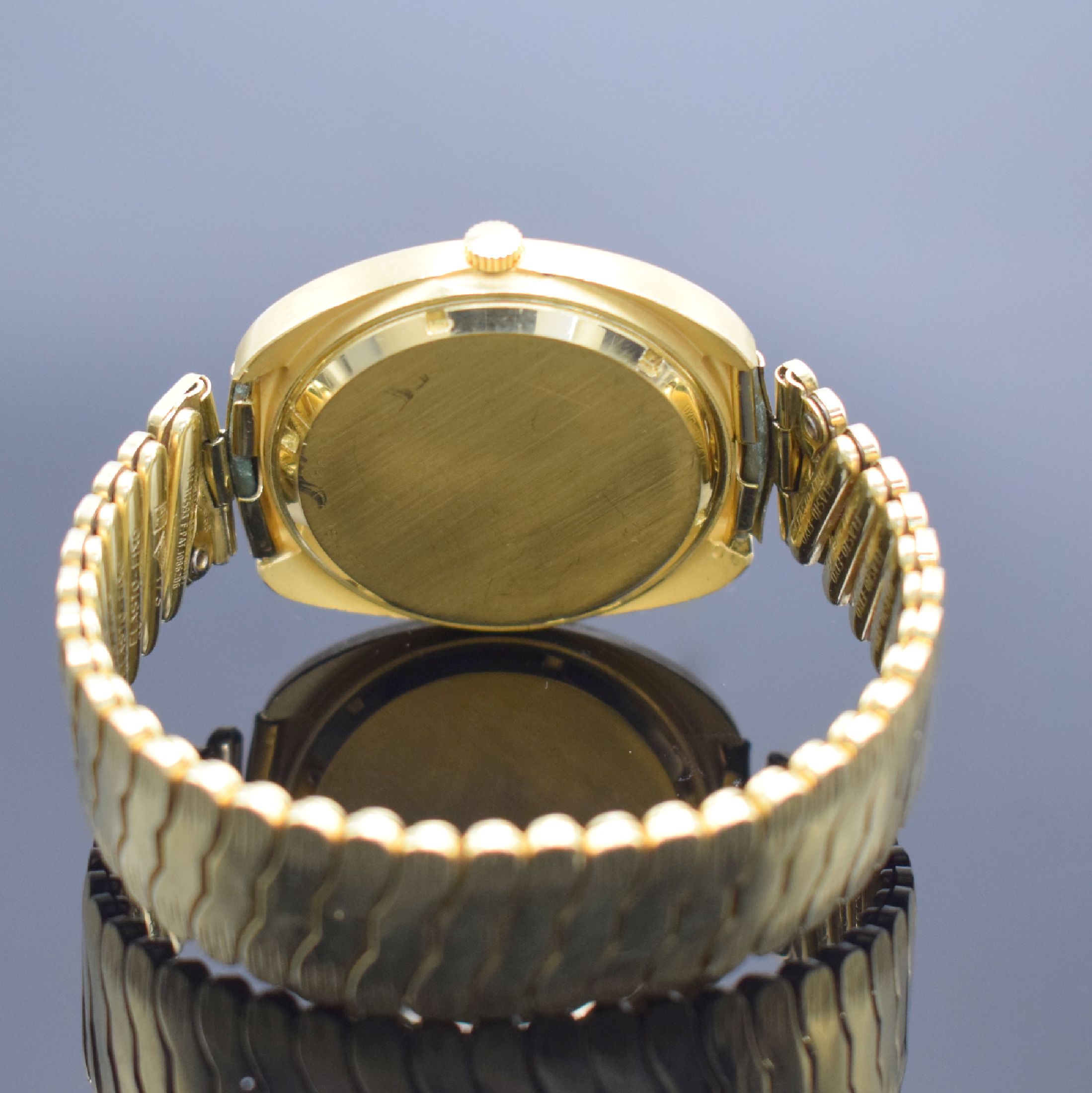 Detail c: GIRARD PERREGAUX seltene Herrenarmbanduhr in GG 750/000 Referenz 9444 an GG 585/000 Elasto-Fixo Band, Schweiz um 1973, massives Geh., Boden verschr., ...