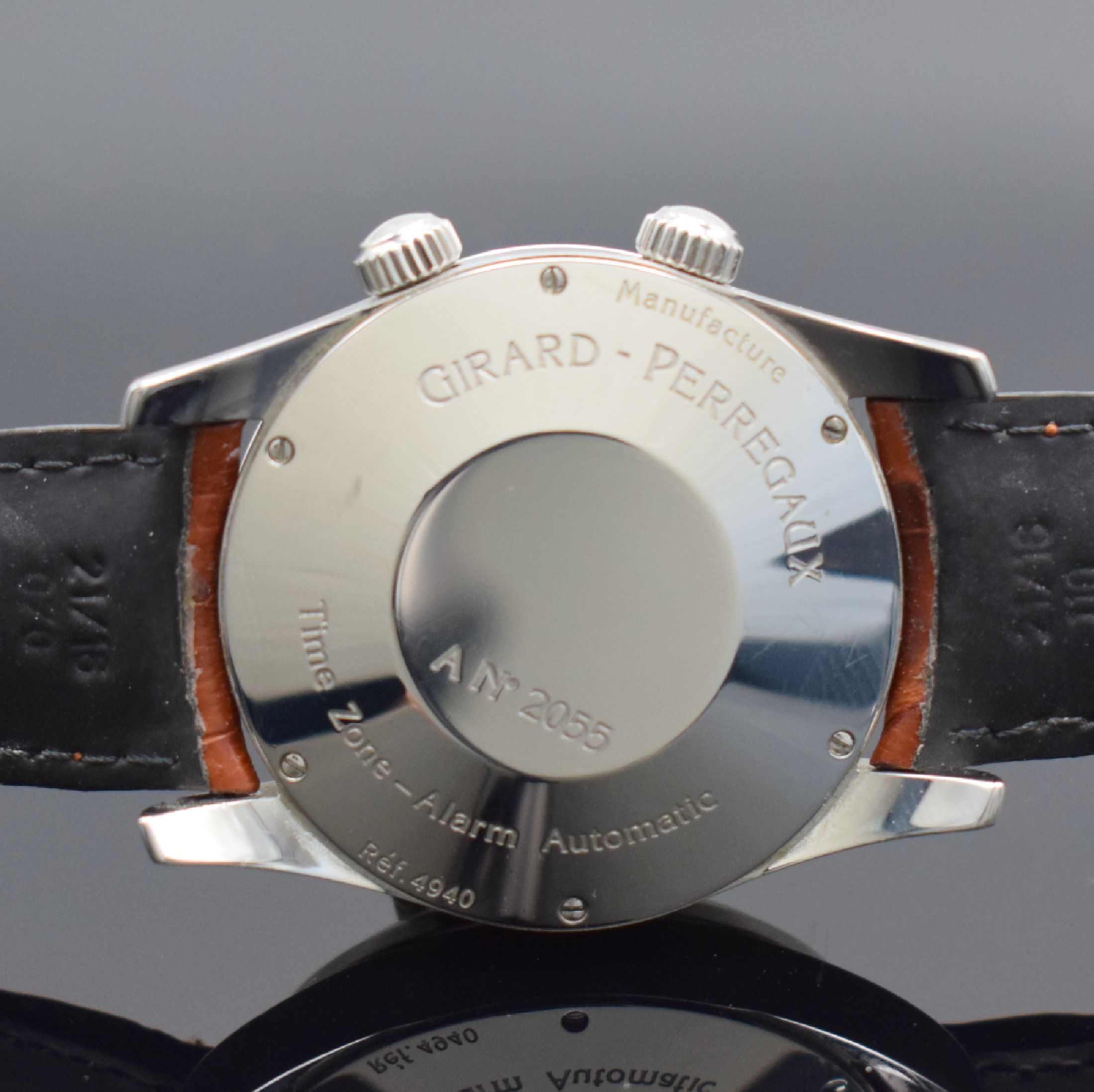 Detail d: GIRARD PERREGAUX Traveller II Herrenarmbanduhr mit Alarm in Stahl Referenz 4940, Schweiz verk. lt. Pap. 08/2001, Automatik, Boden 6- fach verschr., ...