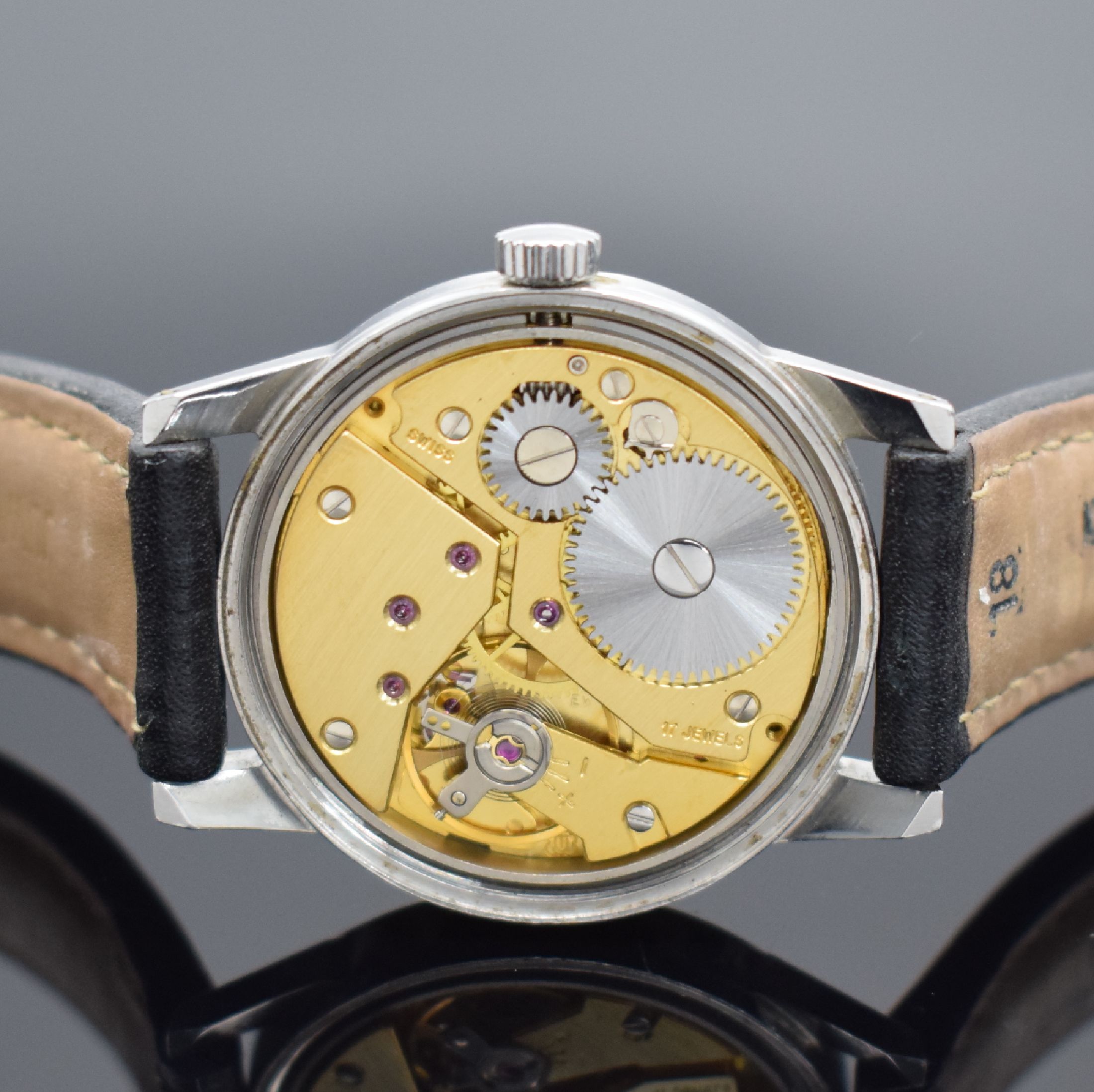 Detail d: ARSA Super Herrenarmbanduhr in Stahl, Schweiz um 1960, Handaufzug, verschr. Boden sign. "Wehrmachtswerk A.Reymond LTD", schwarzes ...