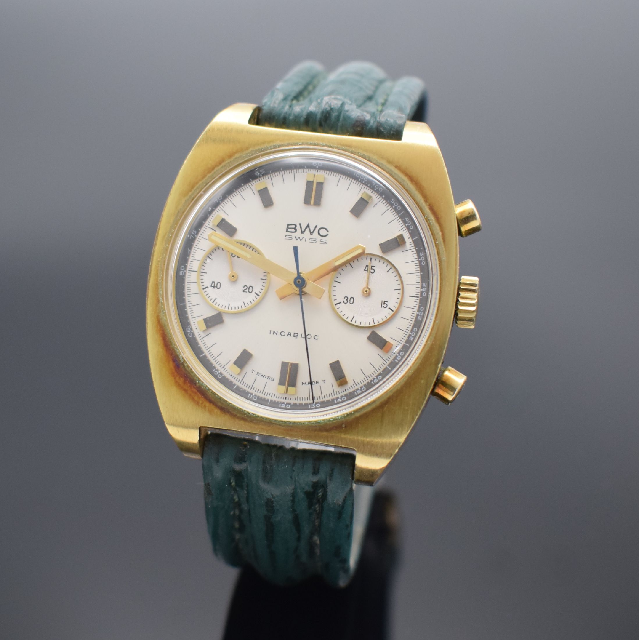 BWC vergoldeter Herrenchronograph, Schweiz verk. lt. beil. Garantie 01/1990, Handaufzug, Geh. teils angel., Boden verschr., silb. Zifferbl. m. ...