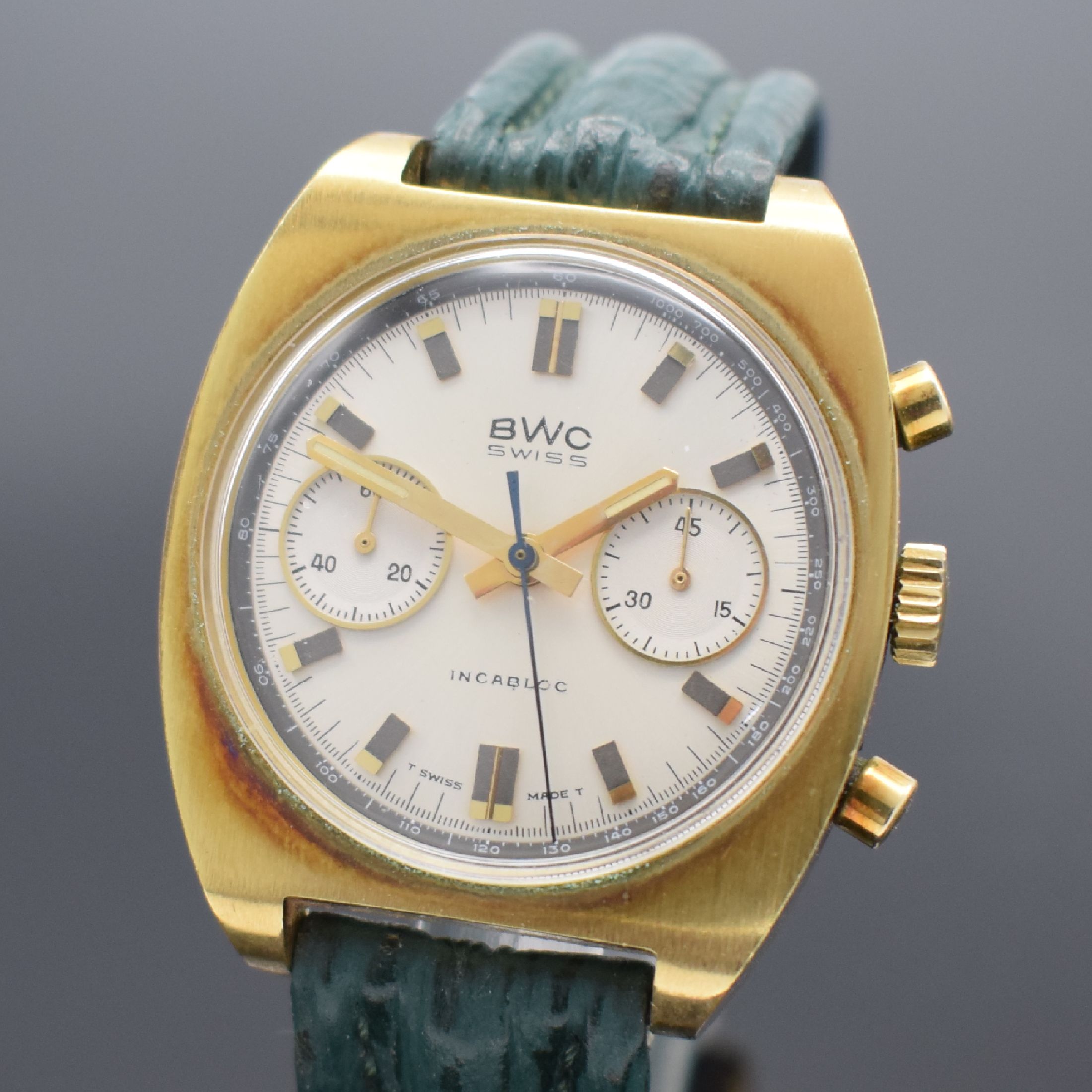 Detail a: BWC vergoldeter Herrenchronograph, Schweiz verk. lt. beil. Garantie 01/1990, Handaufzug, Geh. teils angel., Boden verschr., silb. Zifferbl. m. ...