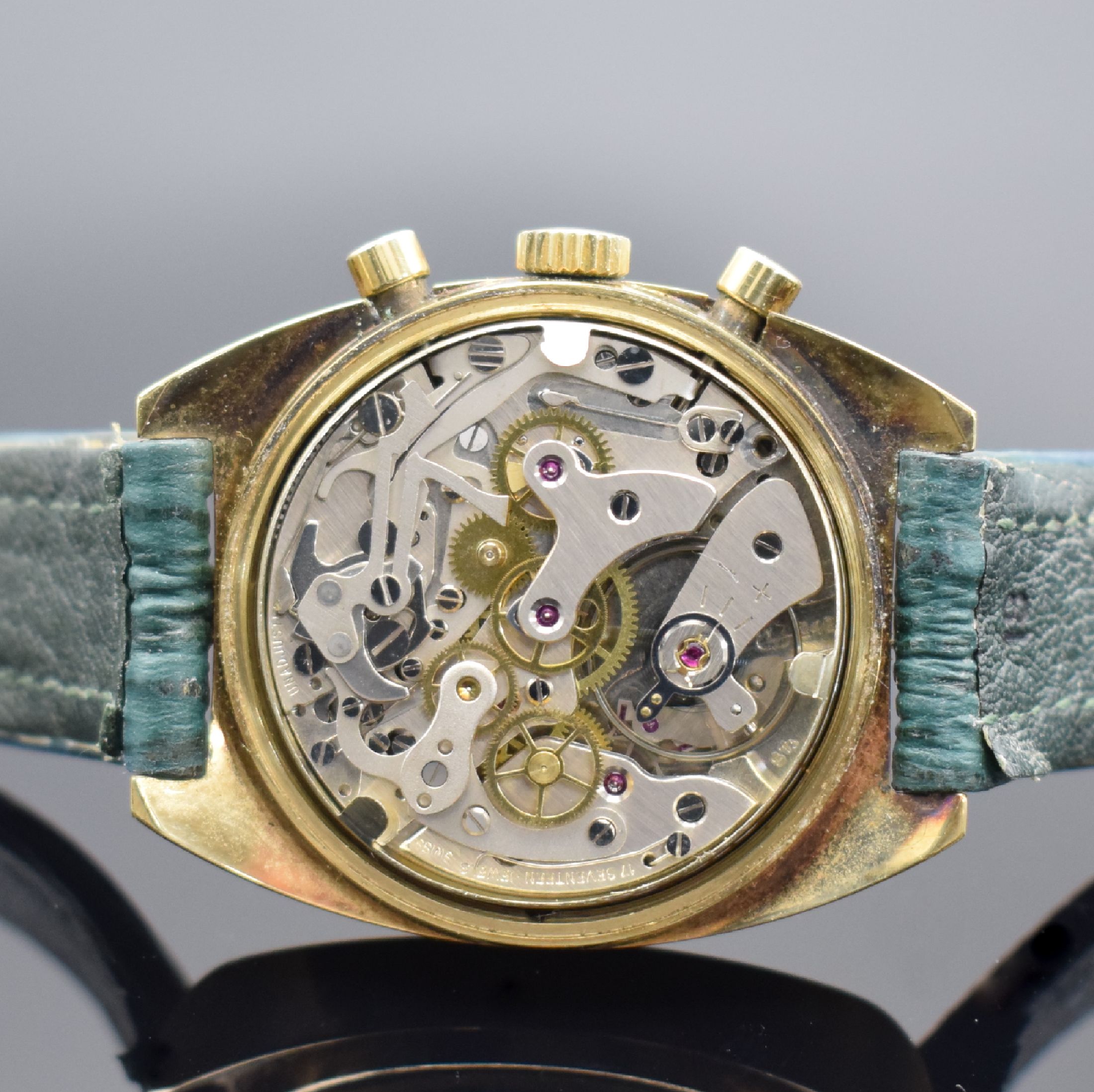 Detail d: BWC vergoldeter Herrenchronograph, Schweiz verk. lt. beil. Garantie 01/1990, Handaufzug, Geh. teils angel., Boden verschr., silb. Zifferbl. m. ...