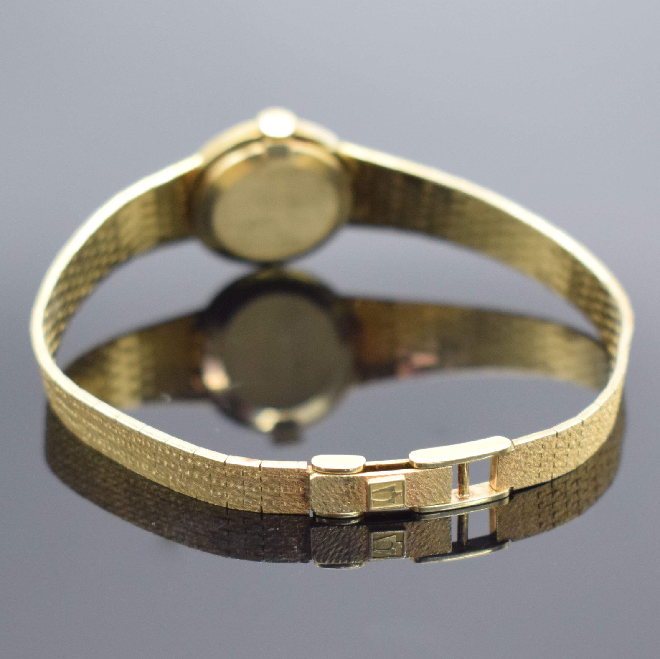 Detail a: BULOVA Damenarmbanduhr in GG 585/000, Schweiz um 1970, Handaufzug, Geh. an Goldband in 585/000, Boden aufgedr., champagnerfarb. Zifferbl. m. arab. ...