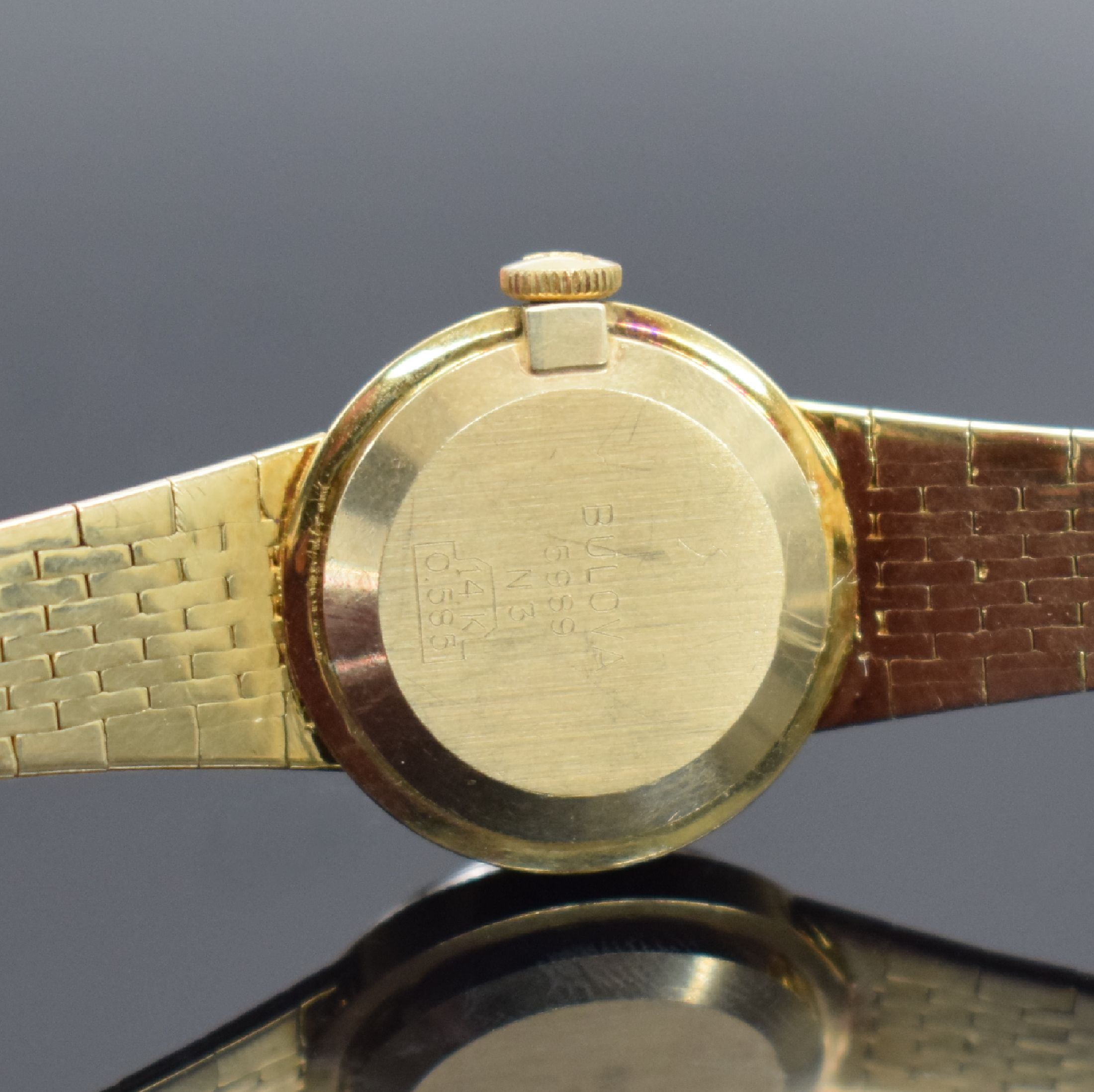 Detail c: BULOVA Damenarmbanduhr in GG 585/000, Schweiz um 1970, Handaufzug, Geh. an Goldband in 585/000, Boden aufgedr., champagnerfarb. Zifferbl. m. arab. ...