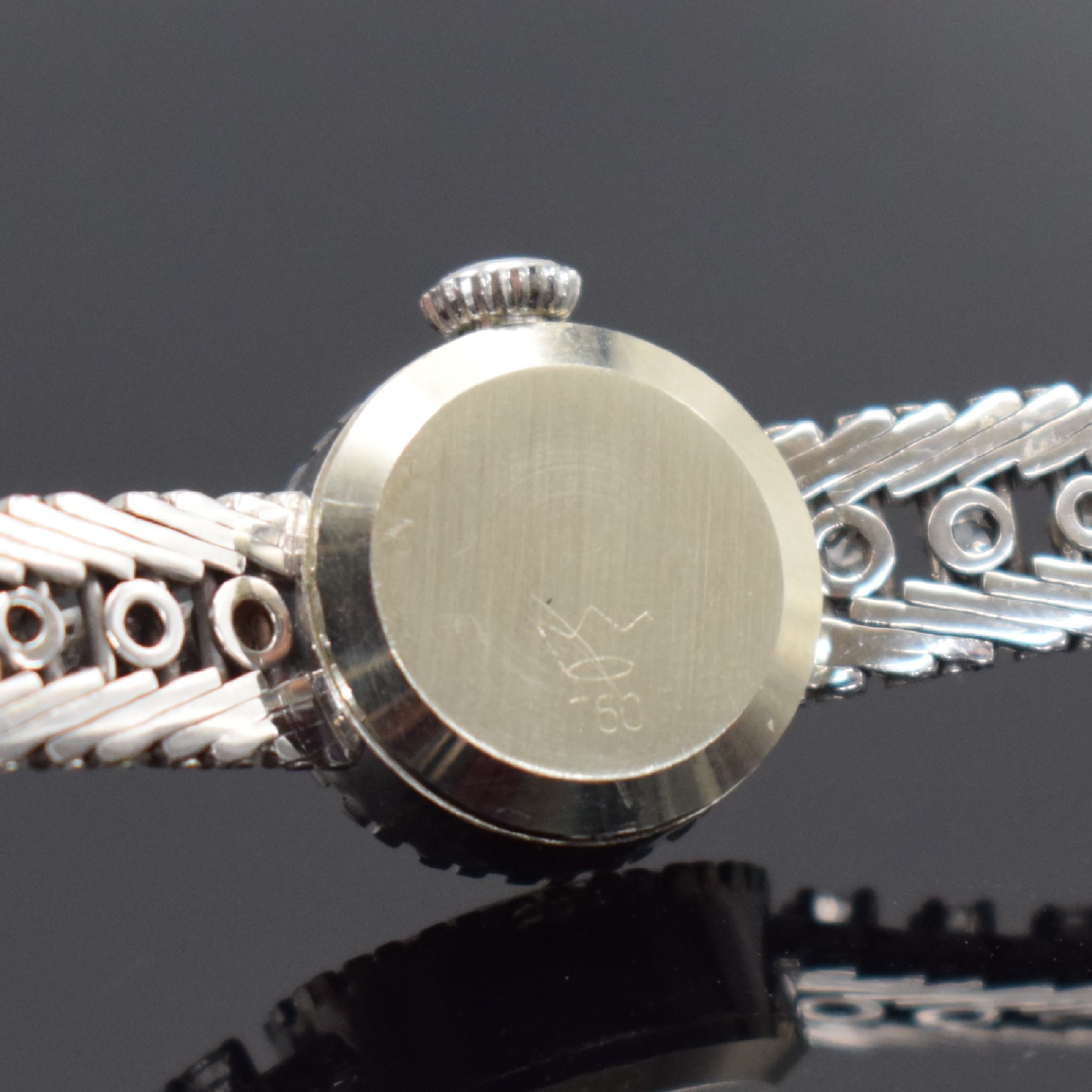 Detail c: ARCTOS Damenarmbanduhr in WG 750/000 mit Diamanten, Schweiz um 1965, Handaufzug, Boden aufgedr., Lünette m. Diamanten bes., silb. Zifferbl. ...