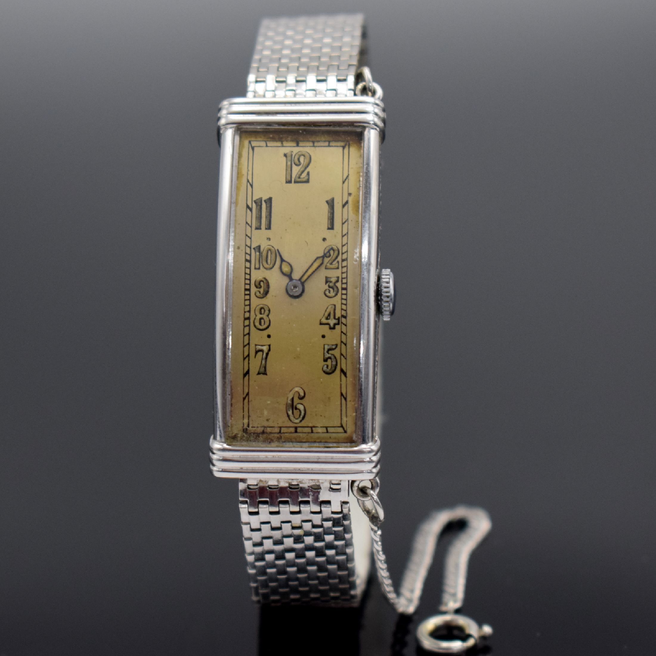 MOVADO sehr seltene rechteckige Armbanduhr in WG 750/000, Schweiz um 1936, Handaufzug, Sicherheitskettchen, Boden aufgedr., WG 585/000 Band, vers. ...