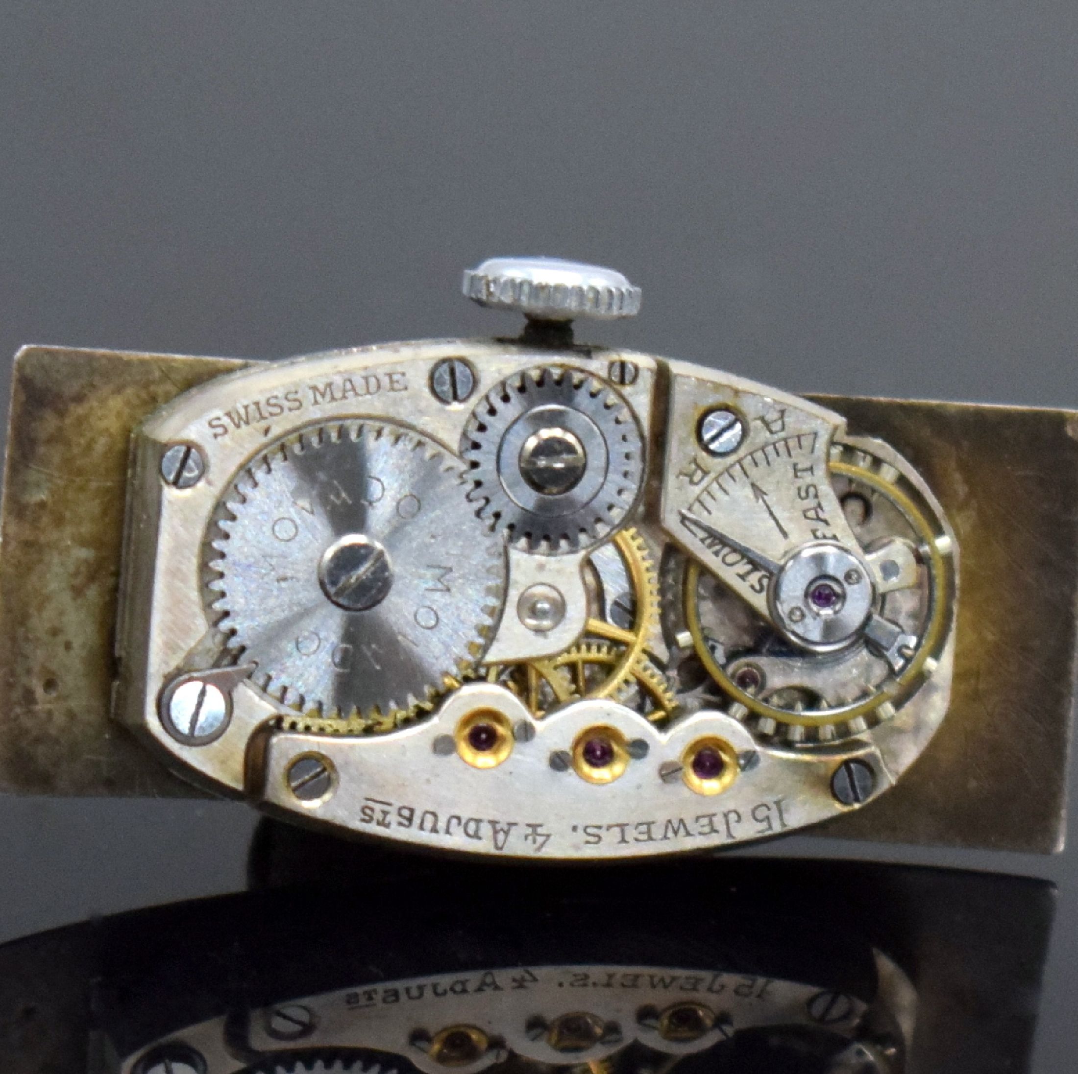 Detail i: MOVADO sehr seltene rechteckige Armbanduhr in WG 750/000, Schweiz um 1936, Handaufzug, Sicherheitskettchen, Boden aufgedr., WG 585/000 Band, vers. ...