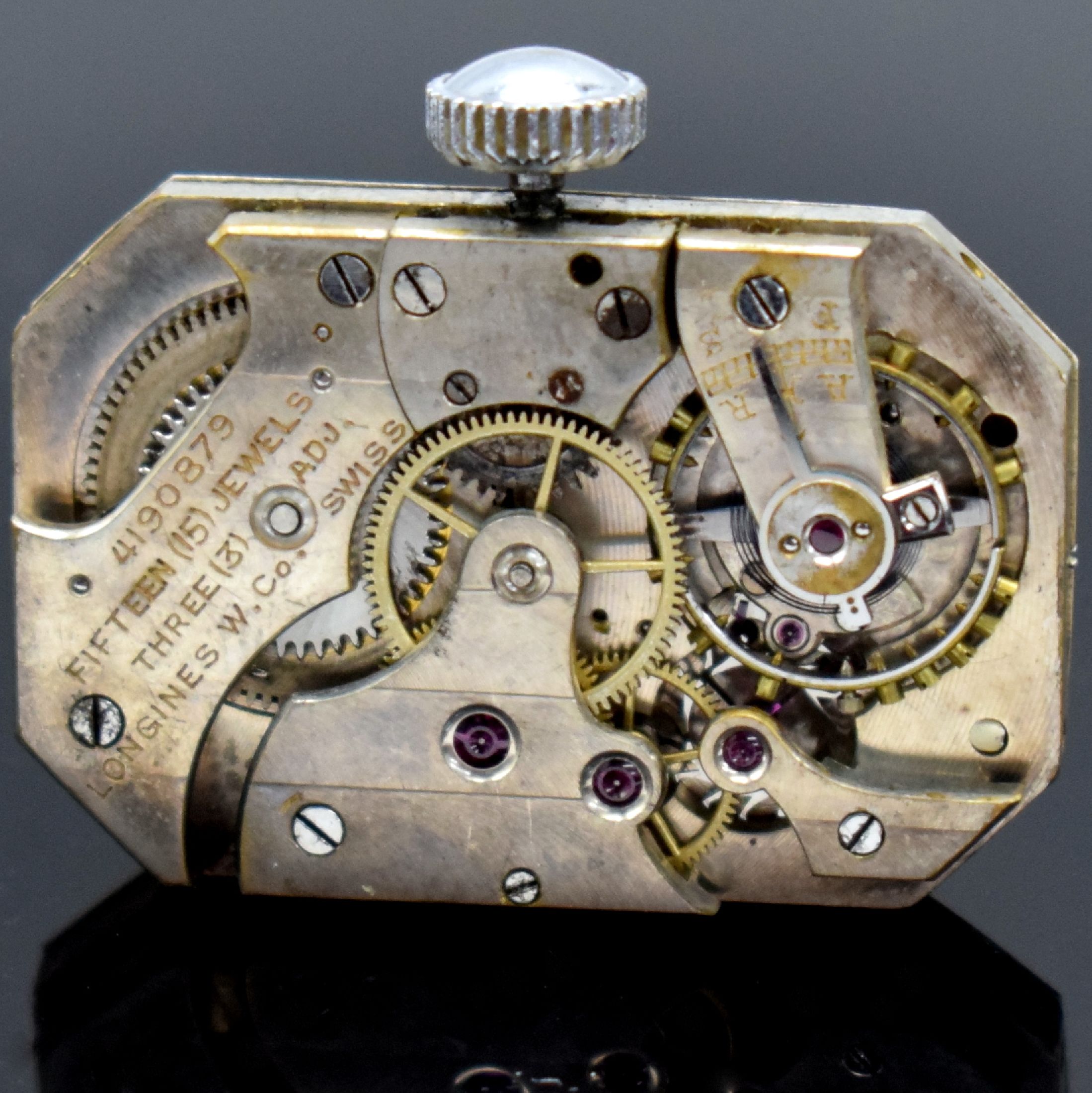 Detail e: LONGINES rechteckige Armbanduhr in 14k Gold- filled, Schweiz um 1930, Handaufzug, grav. Scharnierboden, silb. Zifferbl. rest., arab. Zahlen fl., ...