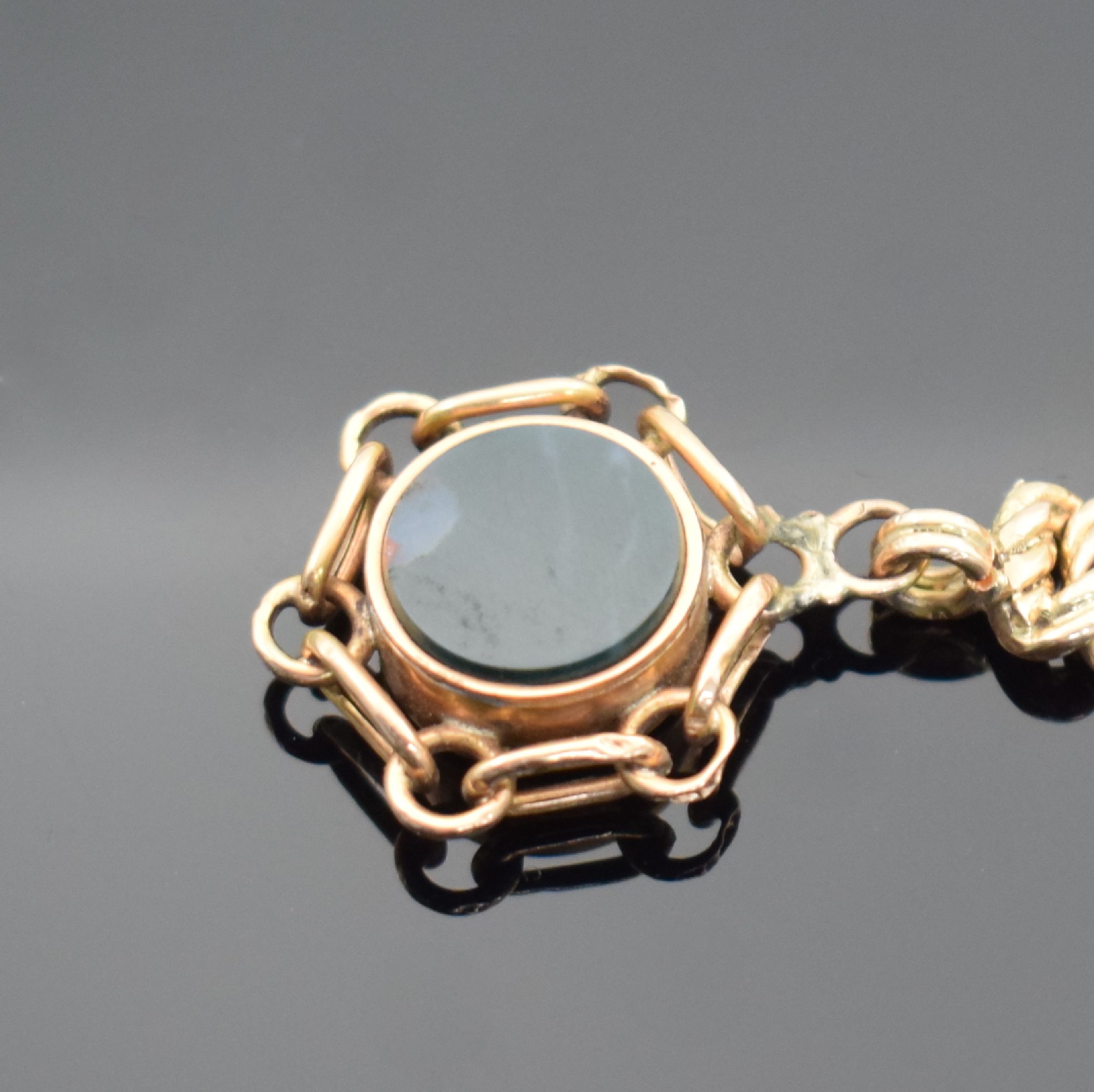 Detail b: Taschenuhrkette in Gold 14k mit Kompass- Anhänger, um 1900, schöne geflochtene Kette m. Karabiner und Federring, leichter Verlauf, L. ca. 33 cm, ...