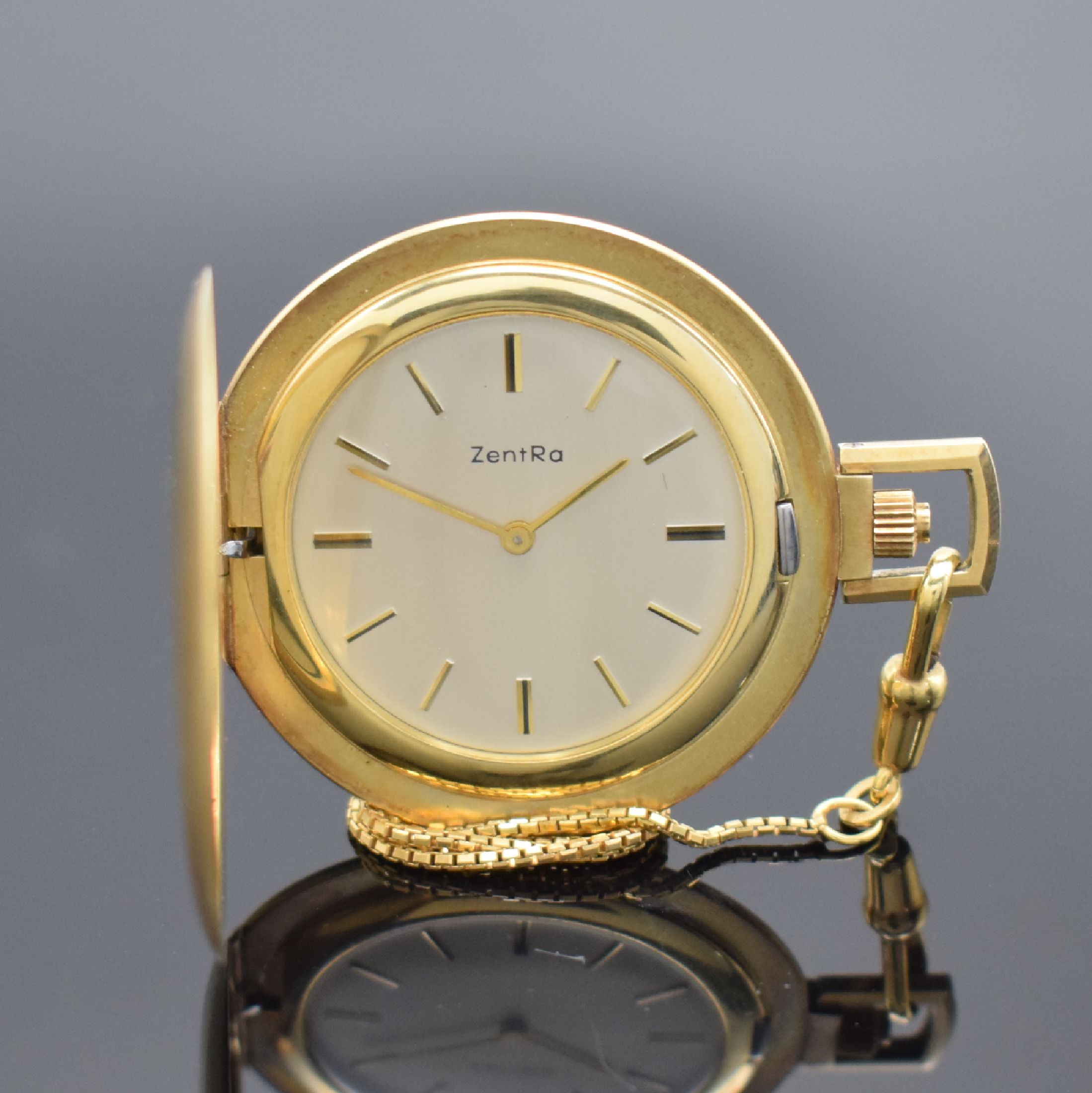 ZENTRA Frackuhr in GG 585/000 mit Kette in GG 333/000, Schweiz um 1970, Handaufzug, schweres gebürstetes Geh., silb. Zifferbl., gold. Indizes & ...