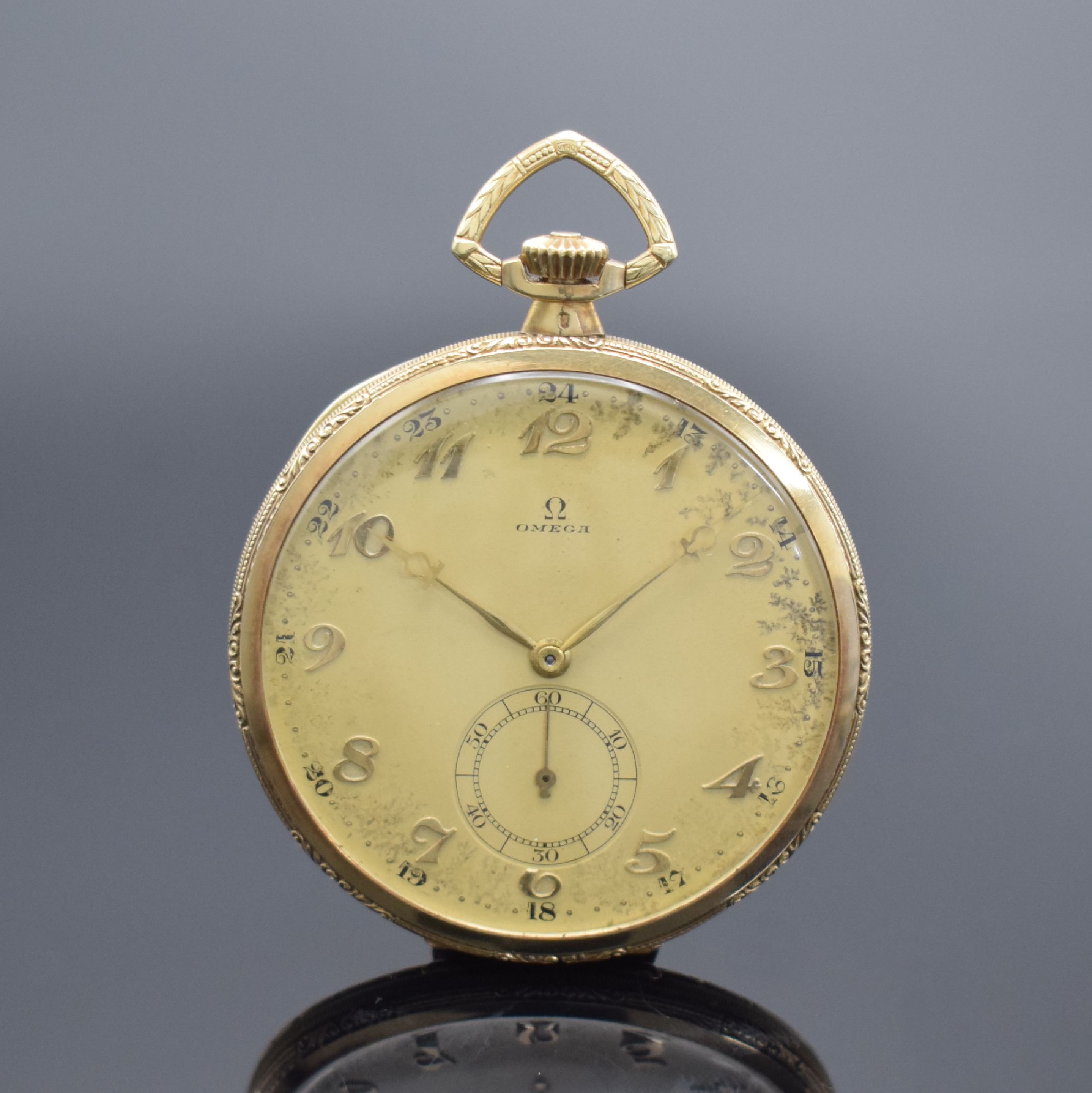 OMEGA Frackuhr in GG 585/000, Schweiz um 1925, flaches, streifen-guill. Geh. m. Monogramm-Grav., fein gerippter Rand, Metallcuvette m. ...