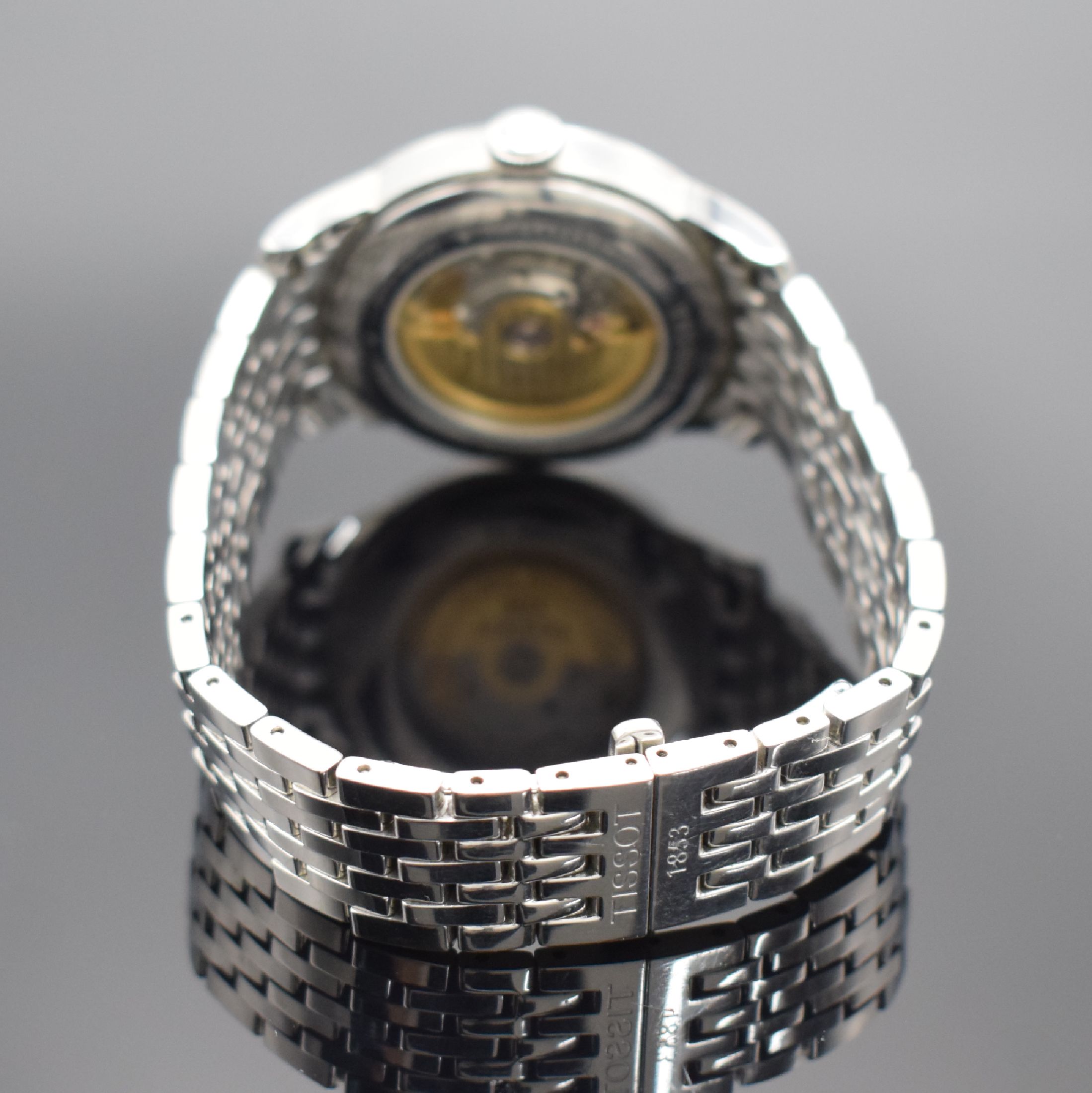 Detail b: TISSOT Le Locle Herrenarmbanduhr in Stahl, Schweiz verk. lt. beil. Pap. 04/2003, Automatik, beids. vergl. Geh., Boden aufgedr., orig. Gliederband m. ...
