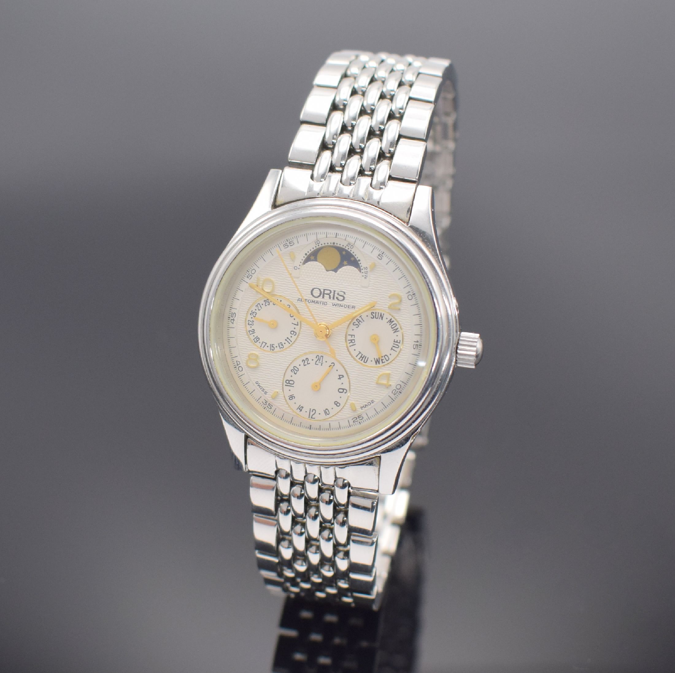 ORIS Herrenarmbanduhr mit Mondphase in Stahl, Schweiz verk. lt. beil. Pap. 03/1998, Automatik, Ref. 7433, beids. vergl. Geh., Boden verschr., orig. ...