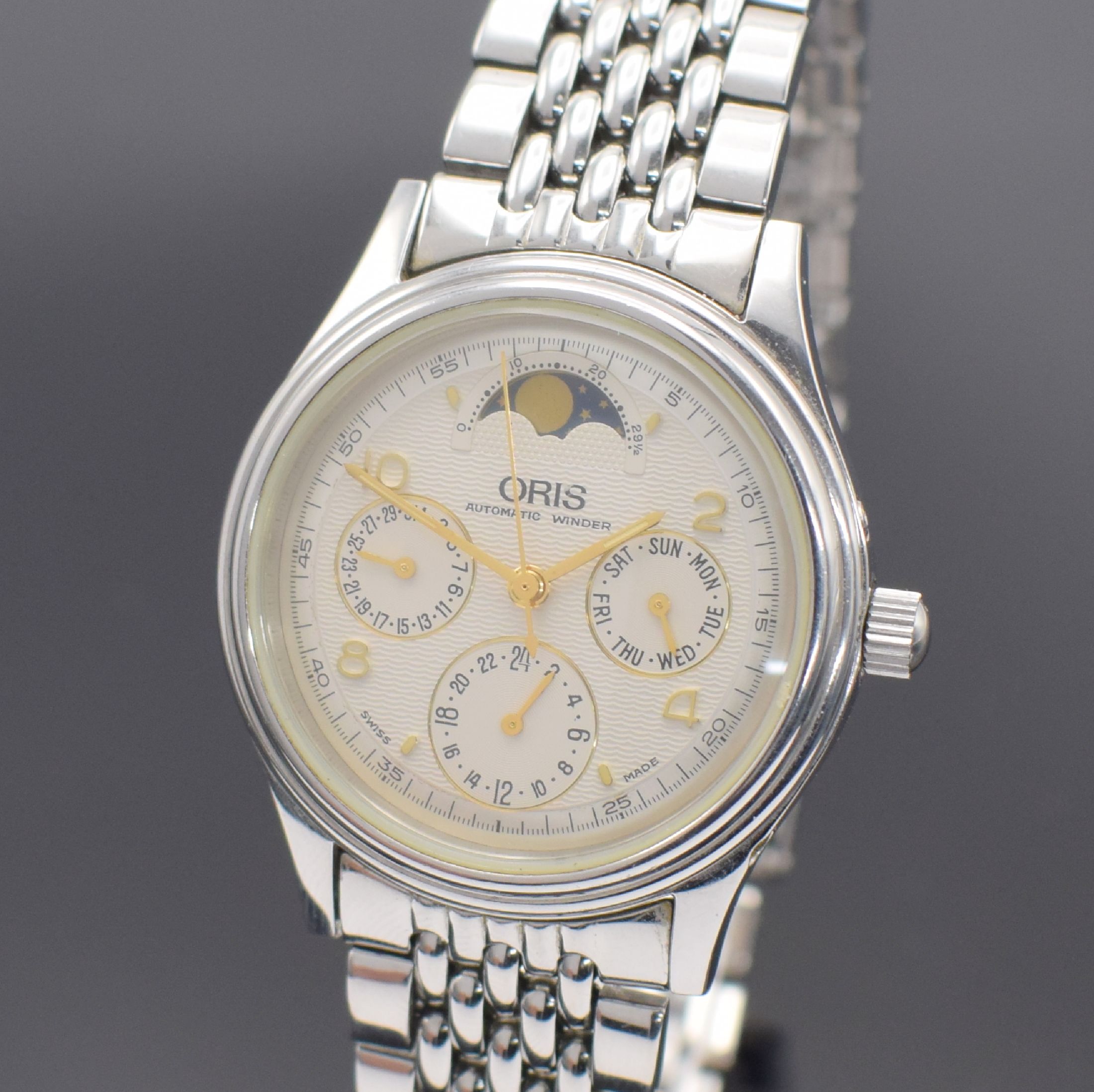 Detail a: ORIS Herrenarmbanduhr mit Mondphase in Stahl, Schweiz verk. lt. beil. Pap. 03/1998, Automatik, Ref. 7433, beids. vergl. Geh., Boden verschr., orig. ...