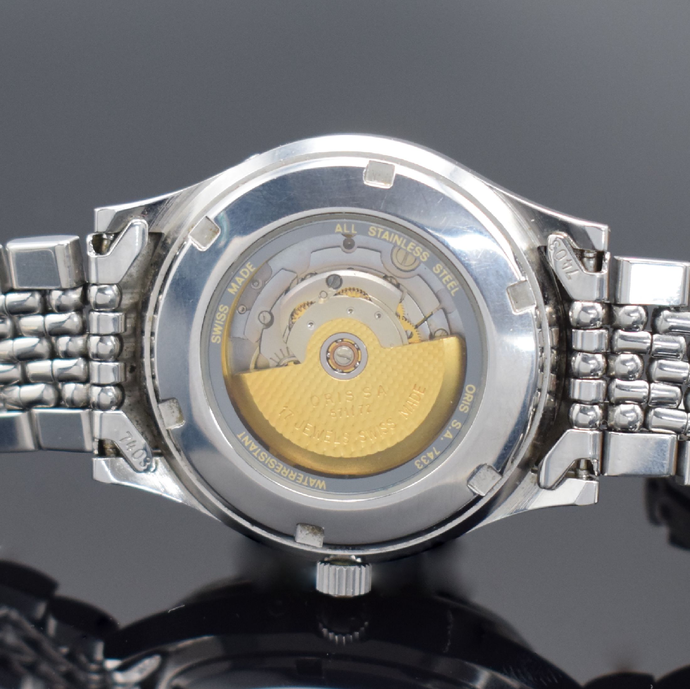 Detail e: ORIS Herrenarmbanduhr mit Mondphase in Stahl, Schweiz verk. lt. beil. Pap. 03/1998, Automatik, Ref. 7433, beids. vergl. Geh., Boden verschr., orig. ...
