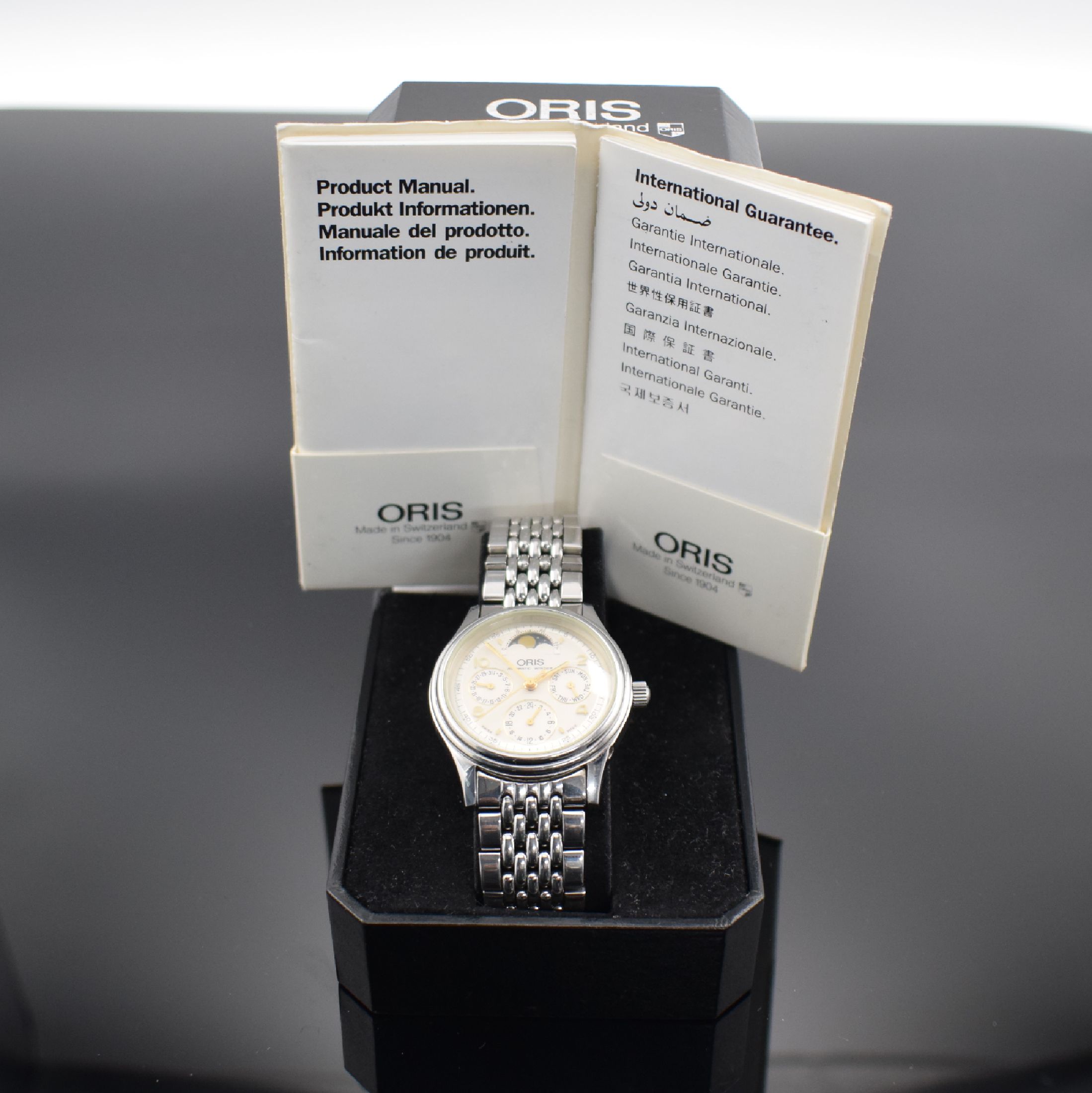 Detail f: ORIS Herrenarmbanduhr mit Mondphase in Stahl, Schweiz verk. lt. beil. Pap. 03/1998, Automatik, Ref. 7433, beids. vergl. Geh., Boden verschr., orig. ...