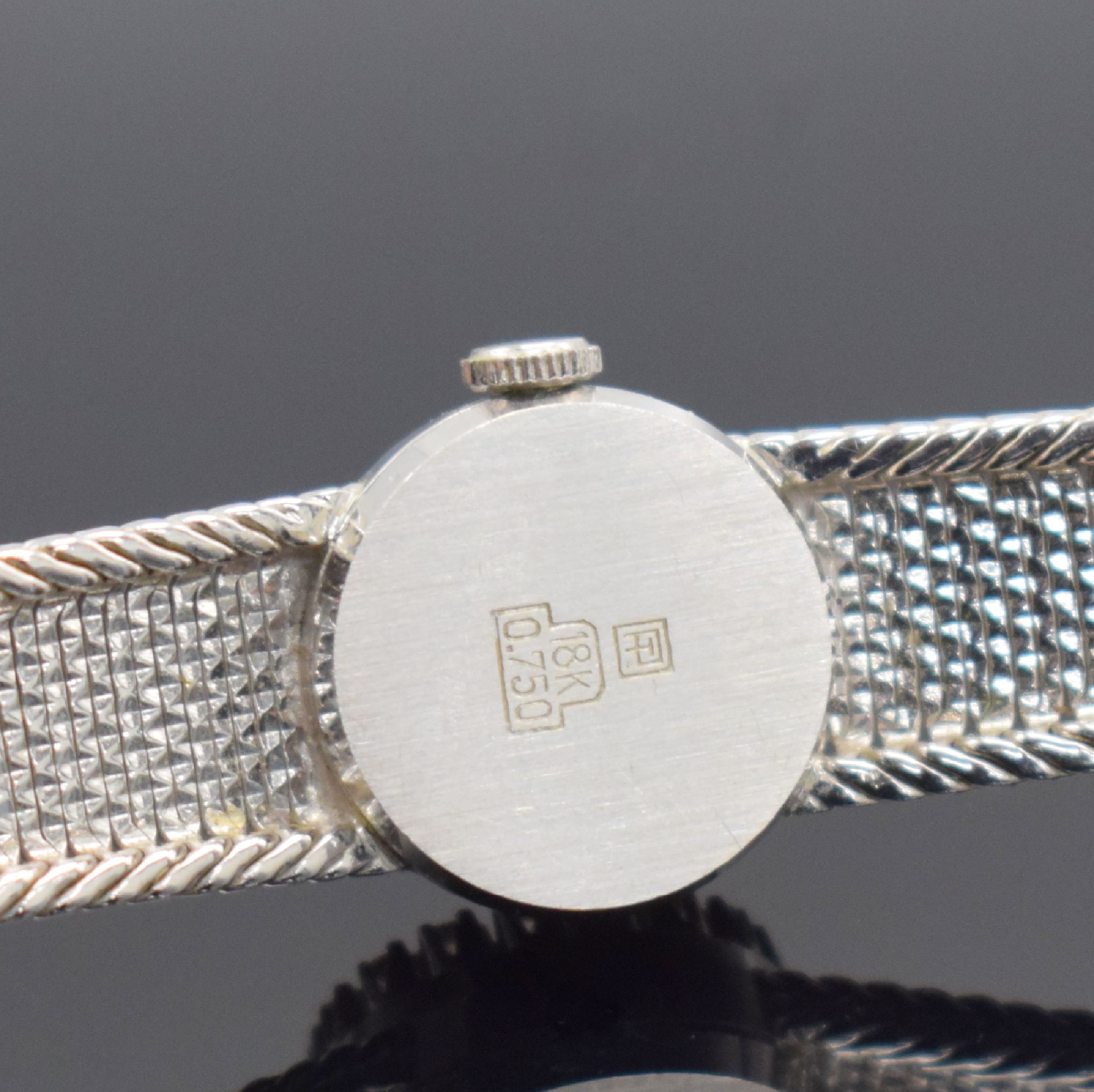 Detail c: LESSA Damenarmbanduhr in WG 750/000 mit Diamanten, Schweiz um 1960, Handaufzug, Milanaiseband, Boden aufgedr., Lünette aufw. m. Diamanten bes., ...