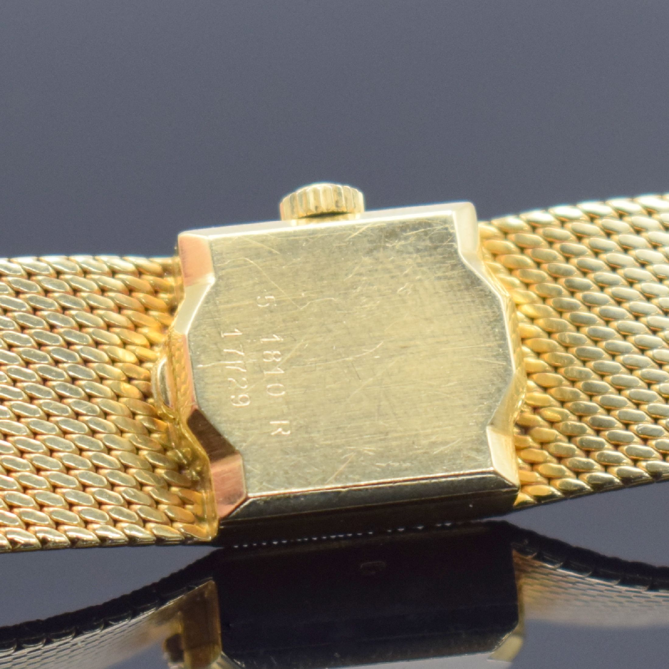 Detail e: MILUS Damenarmbanduhr in GG 750/000, Schweiz um 1960, Handaufzug, Milanaiseband, Boden aufgedr., champagnerfarb. Zifferbl. m. aufgel. Std.-Ind., ...