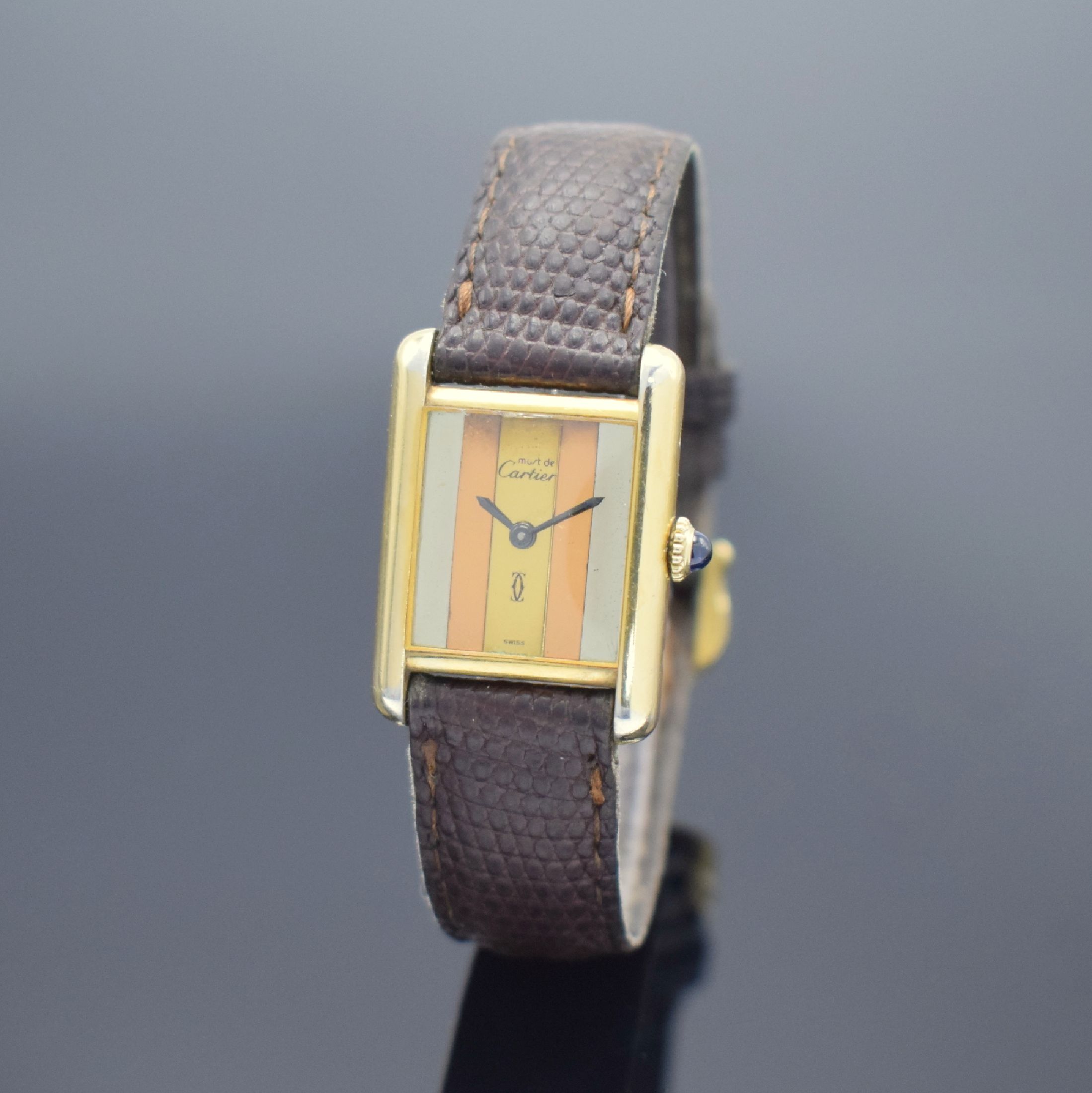 CARTIER Damenarmbanduhr Modellserie Tank, Handaufzug, Schweiz um 1980, verg. Sterlingsilbergeh. inkl. orig. Lederband m. verg. Dornschl., Boden ...