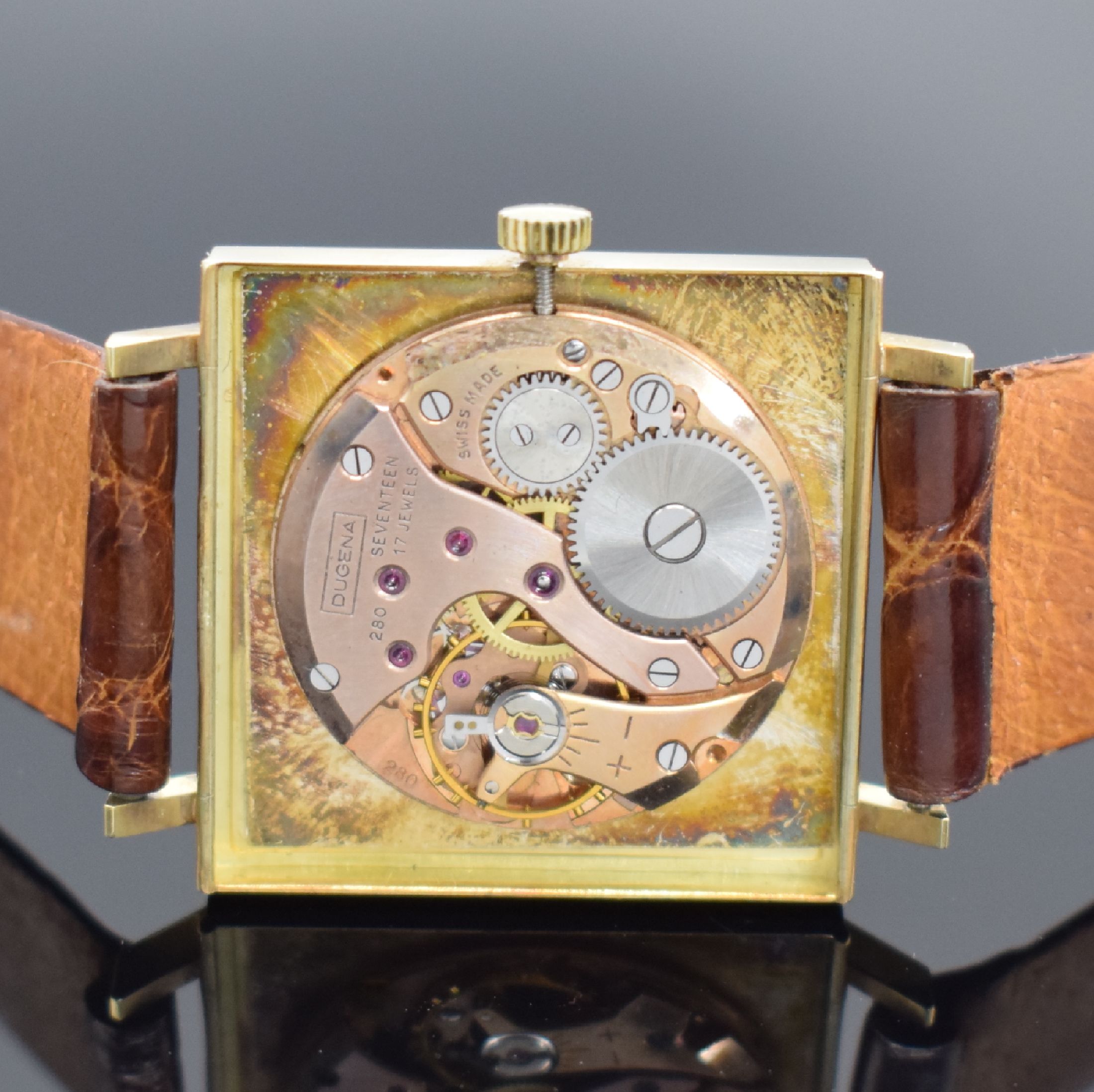 Detail d: DUGENA Precision Armbanduhr in GG 585/000, Schweiz um 1965, Handaufzug, Boden aufgedr., silb. Zifferbl. m. gold. Std.-Ind. & -Zeigern, rotverg. Werk ...