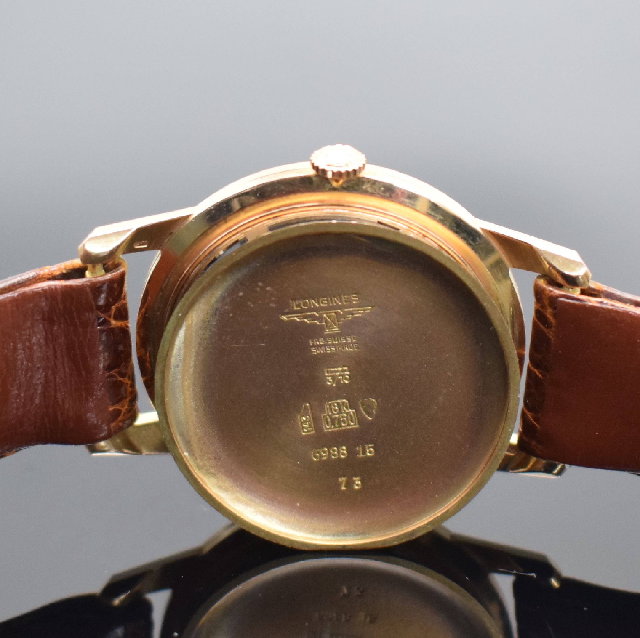 Detail g: LONGINES Armbanduhr in RG 750/000, Schweiz um 1965, Handaufzug, Boden aufgedr., orig. Lederband m. verg. Dornschl., silb. Zifferbl. m. gold. ...