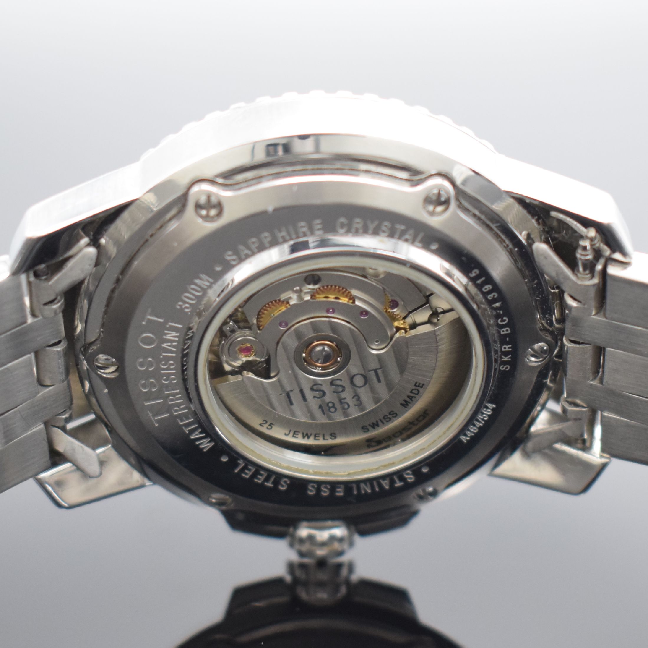 Detail e: TISSOT Seastar 1000 Herrenarmbanduhr in Stahl, Schweiz um 2010, Automatik, Ref. A464/564, beids. vergl. Geh., Boden 6-fach verschr., Krone verschr., ...