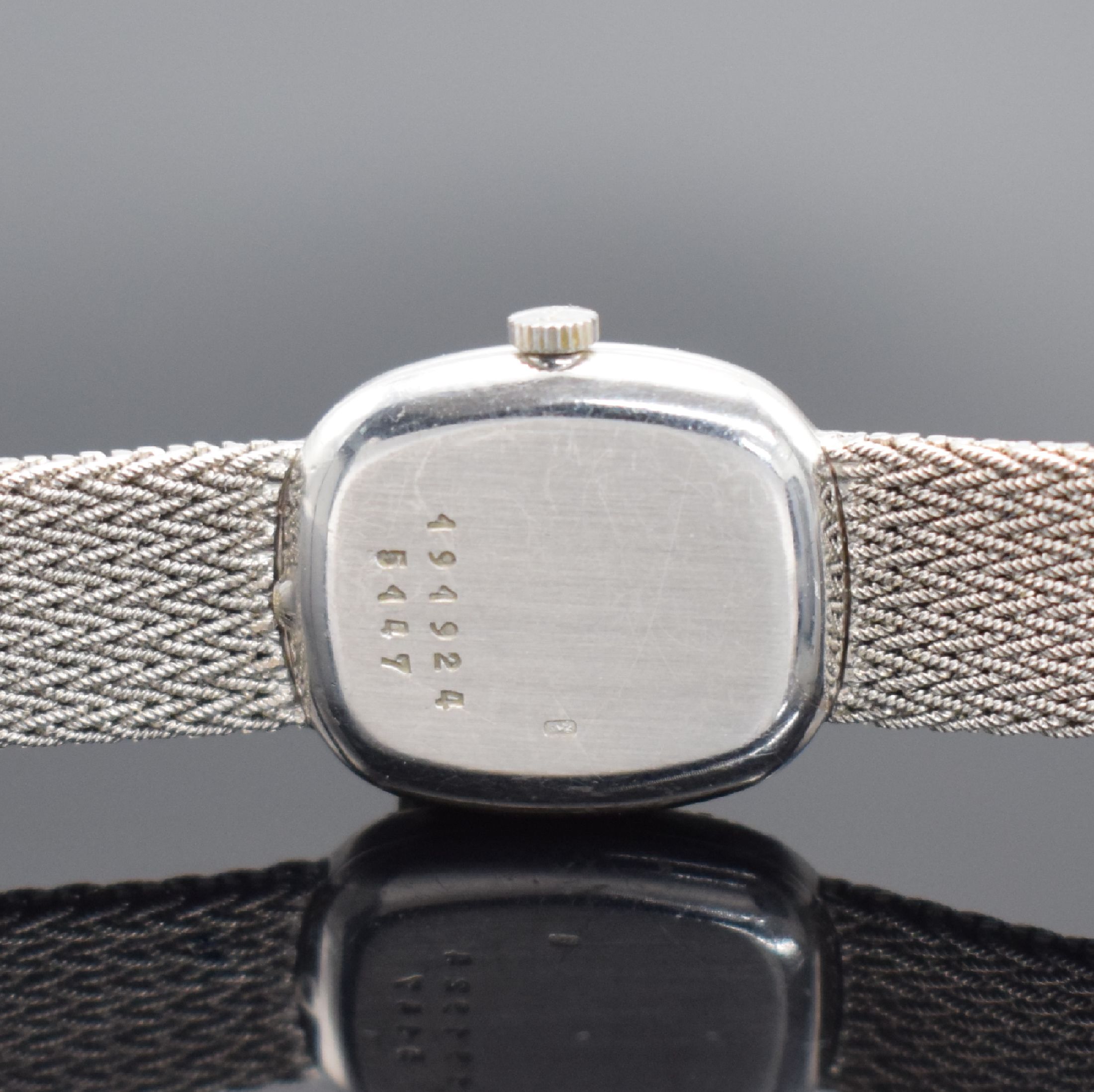 Detail e: CHOPARD Damenarmbanduhr in WG 750/000 Referenz 5147, Schweiz um 1990, quarz, 2-teil. Geh., Boden aufgedr., Lünette aufw. m. Diamanten bes., silb. ...