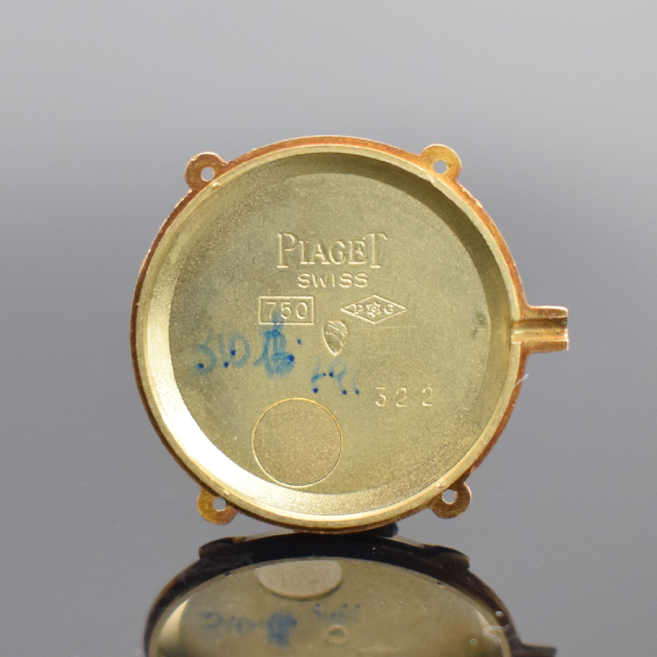Detail e: PIAGET Damenarmbanduhr in GG 750/000 Referenz 98120, Schweiz um 1980, Handaufzug, 2-teil. Gehäuse, Boden verschr., gold. Zifferbl. m. röm. Zahlen, ...