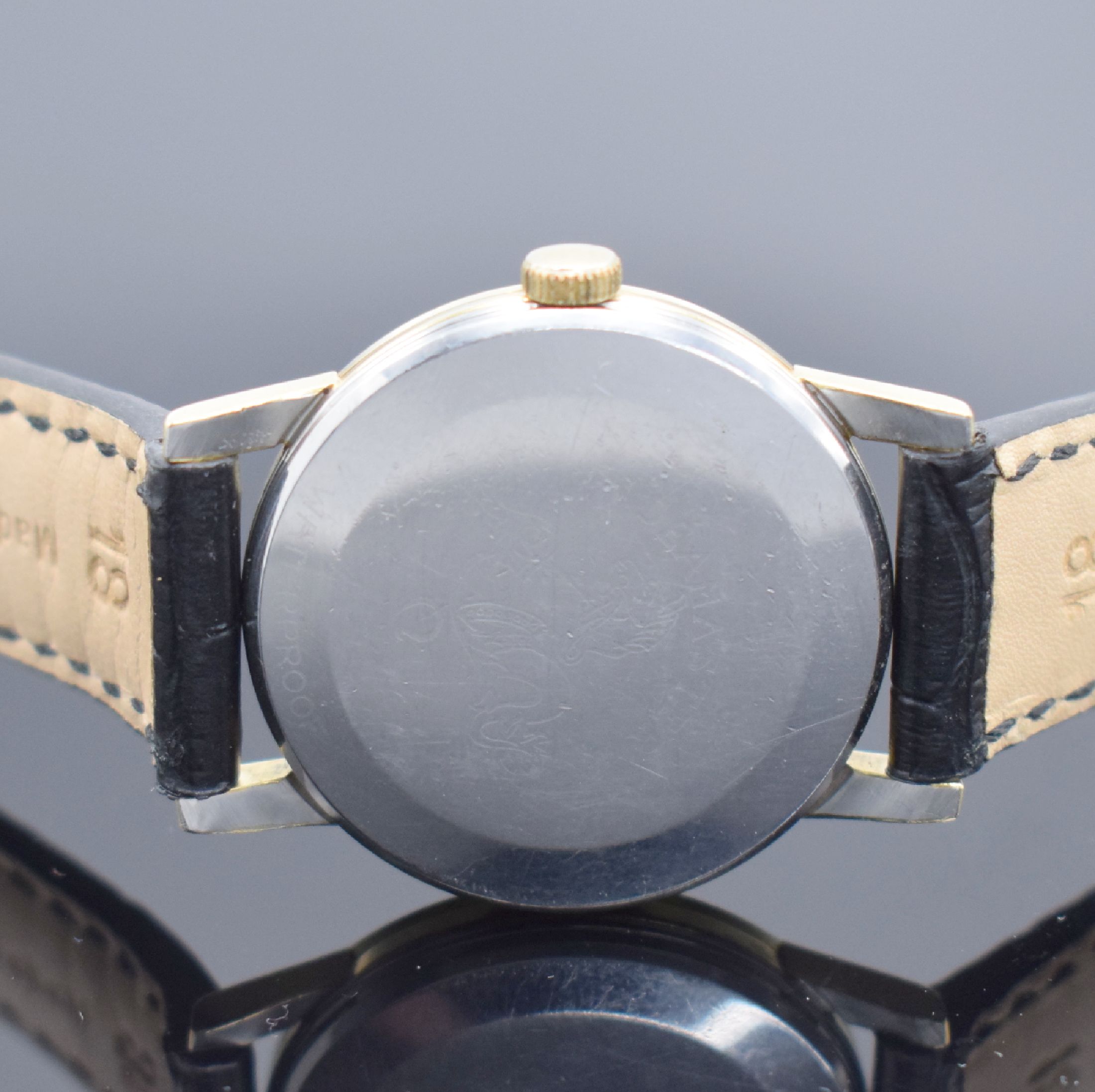 Detail c: OMEGA Seamaster Herrenarmbanduhr, Schweiz um 1961, Handaufzug, Referenz 2964/2970 2 SC, Stahlgehäuse m. Goldhaube, Boden gedr., silb. Zifferbl. m. ...