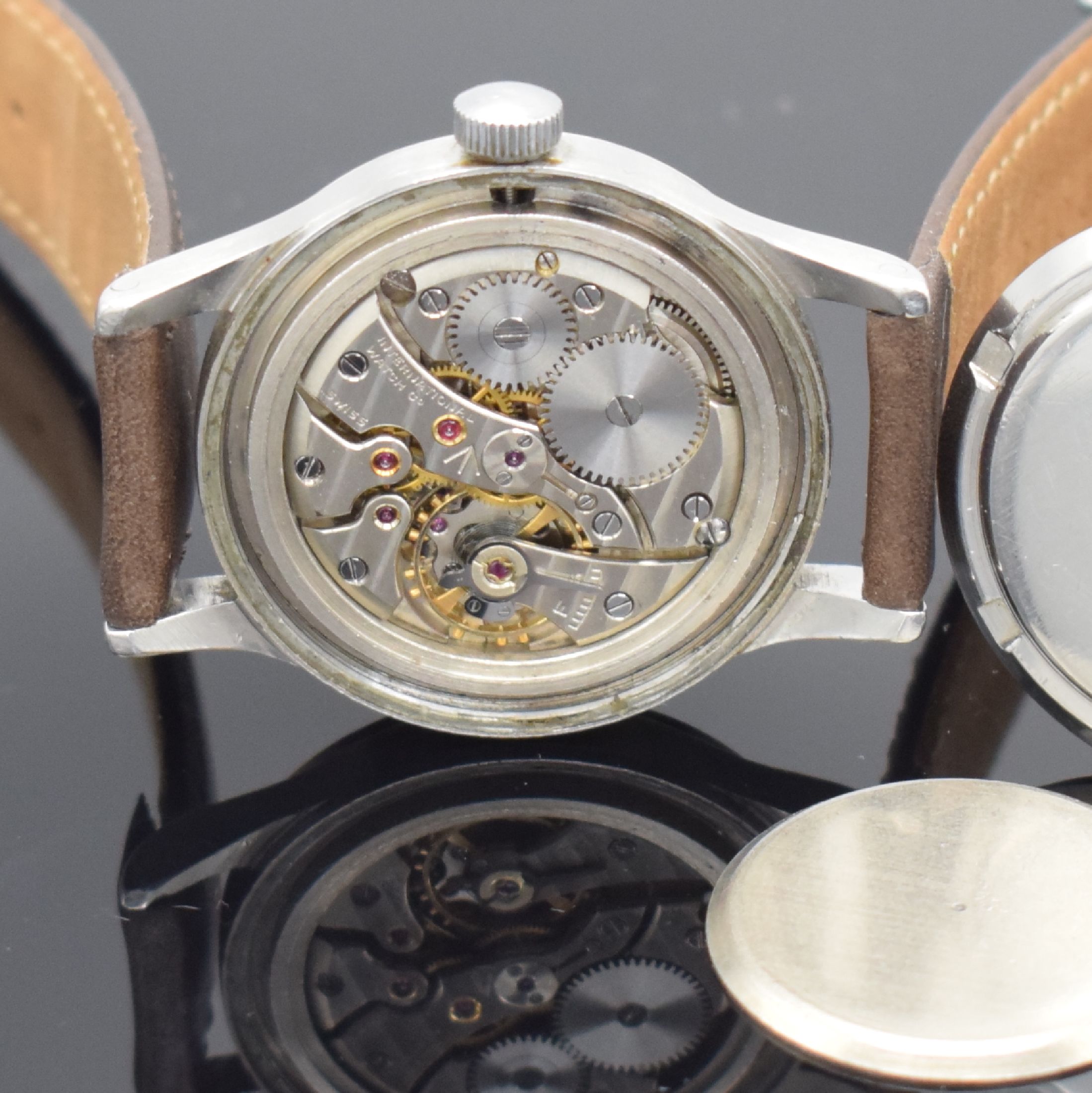 Detail g: IWC Mark XI Fliegeruhr der Royal Air Force, Schweiz um 1950, Handaufzug, verschr. Stahlgeh. m. Weicheisen-Innengehäuse, schwarzes Tritiumzifferbl., ...