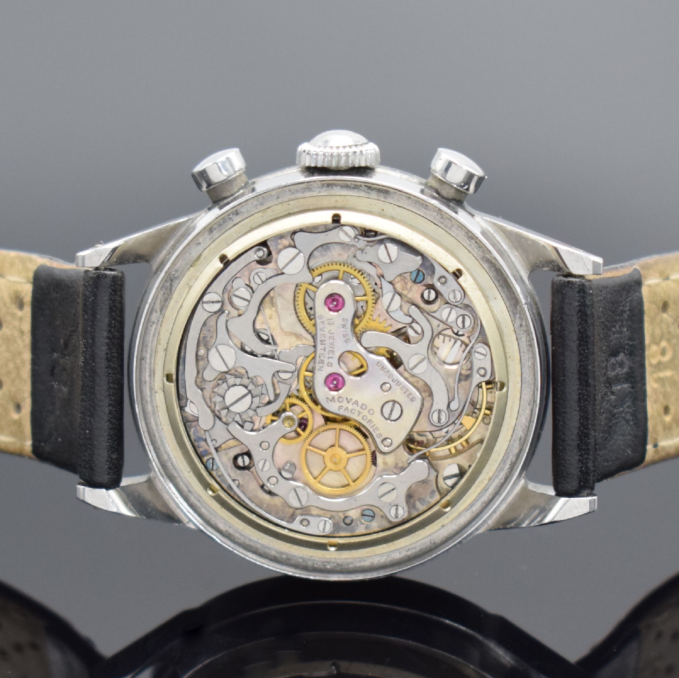 Detail e: MOVADO Chronograph in Stahl mit Kaliber 90, Schweiz um 1955, Handaufzug, 2-teil. Gehäuse, Boden geschr., silb. Zifferbl. rest., gold. Std.-Ind., ...