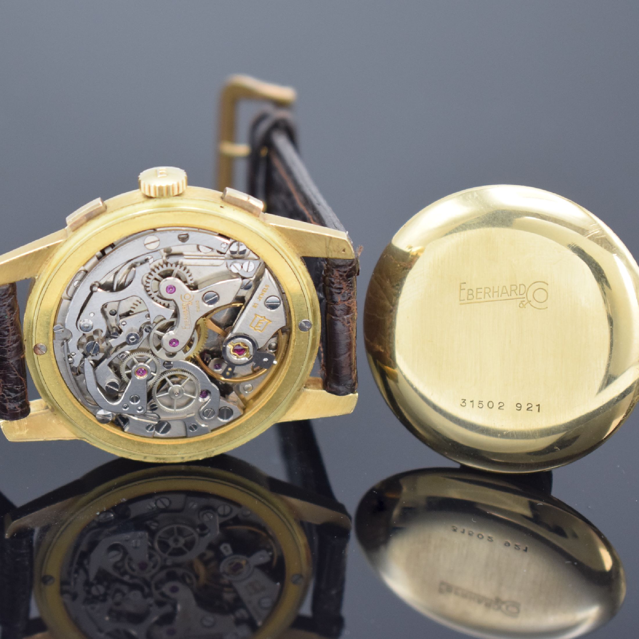 Detail i: EBERHARD & CO. Contodat Armbandchronograph mitSchaltrad in GG 750/000, Schweiz um 1968, Handaufzug, Boden & Glasrand aufgedr., Korrekturdr. seitl. b. ...