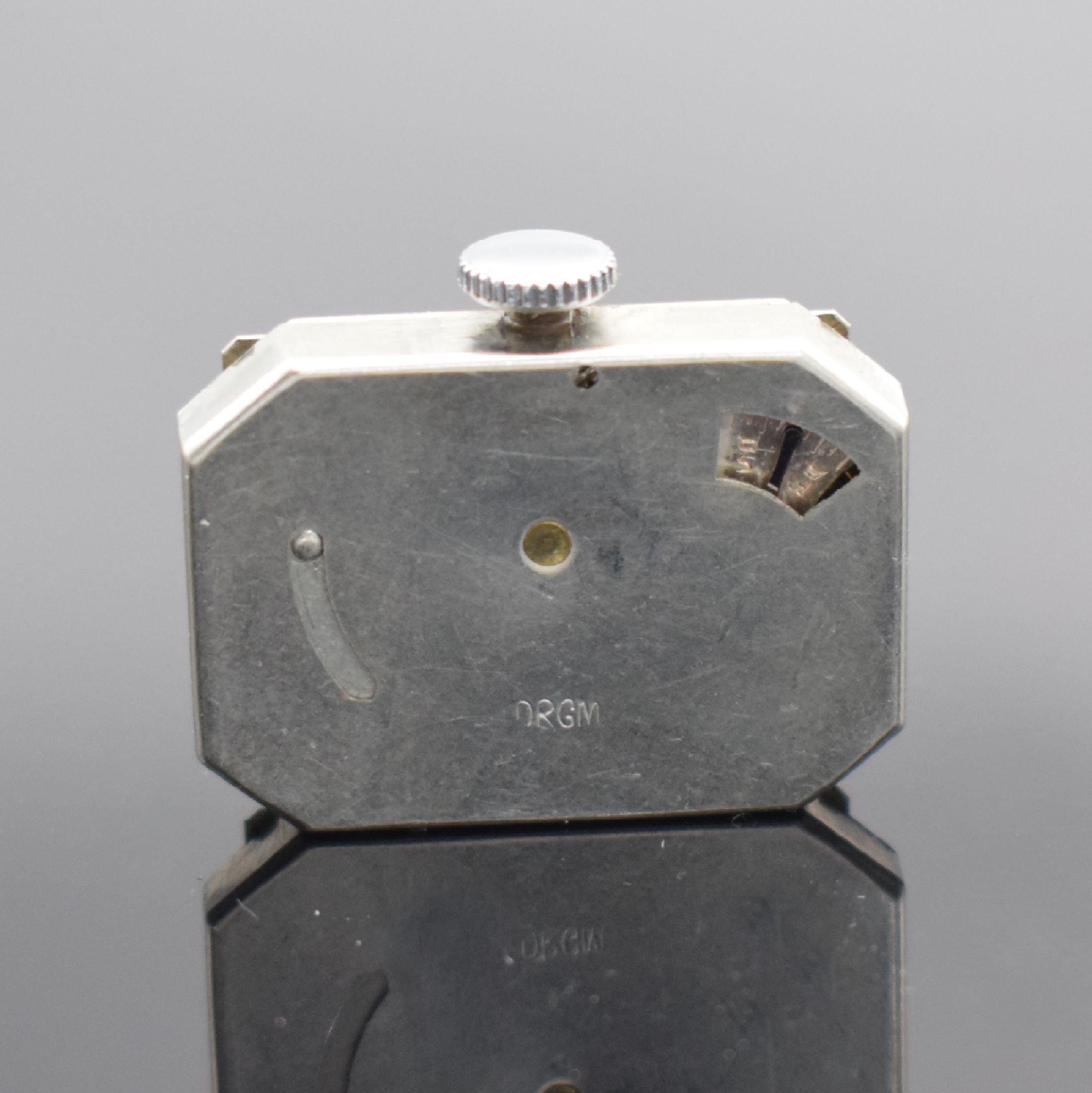 Detail d: TUTIMA Glashütte / UROFA 58 rechteckige Lagerbestand-Armbanduhr in Stahl, Deutschland um 1935, Scharniergeh. m. Schutzlack auf dem Boden, orig. Band ...