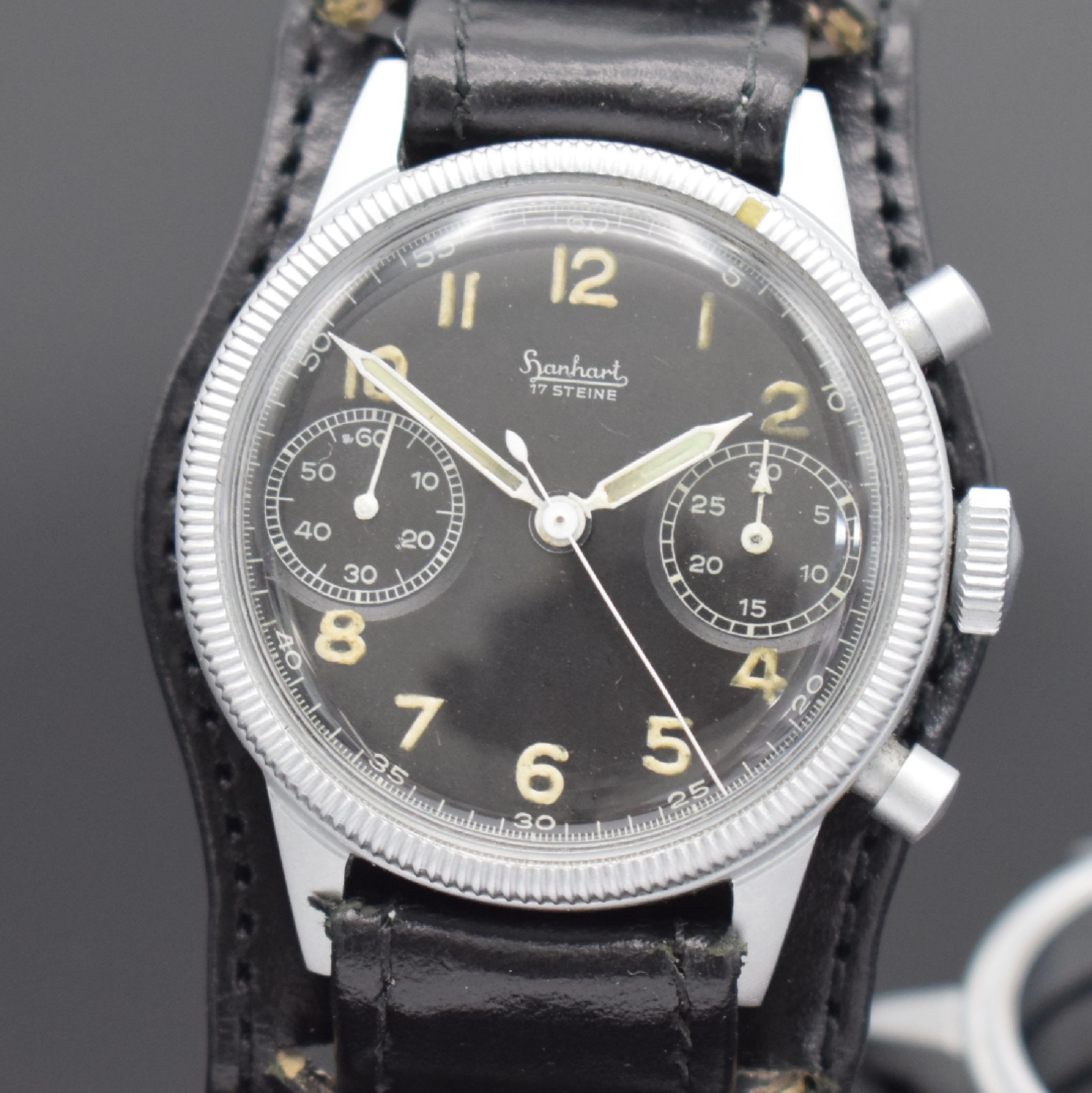 Detail b: HANHART Flyback Fliegerchronograph der Bundeswehr Typ 417, Deutschland um 1960, Handaufzug, verchr. Messinggeh., Boden aufgedr., beids. drehb. ...