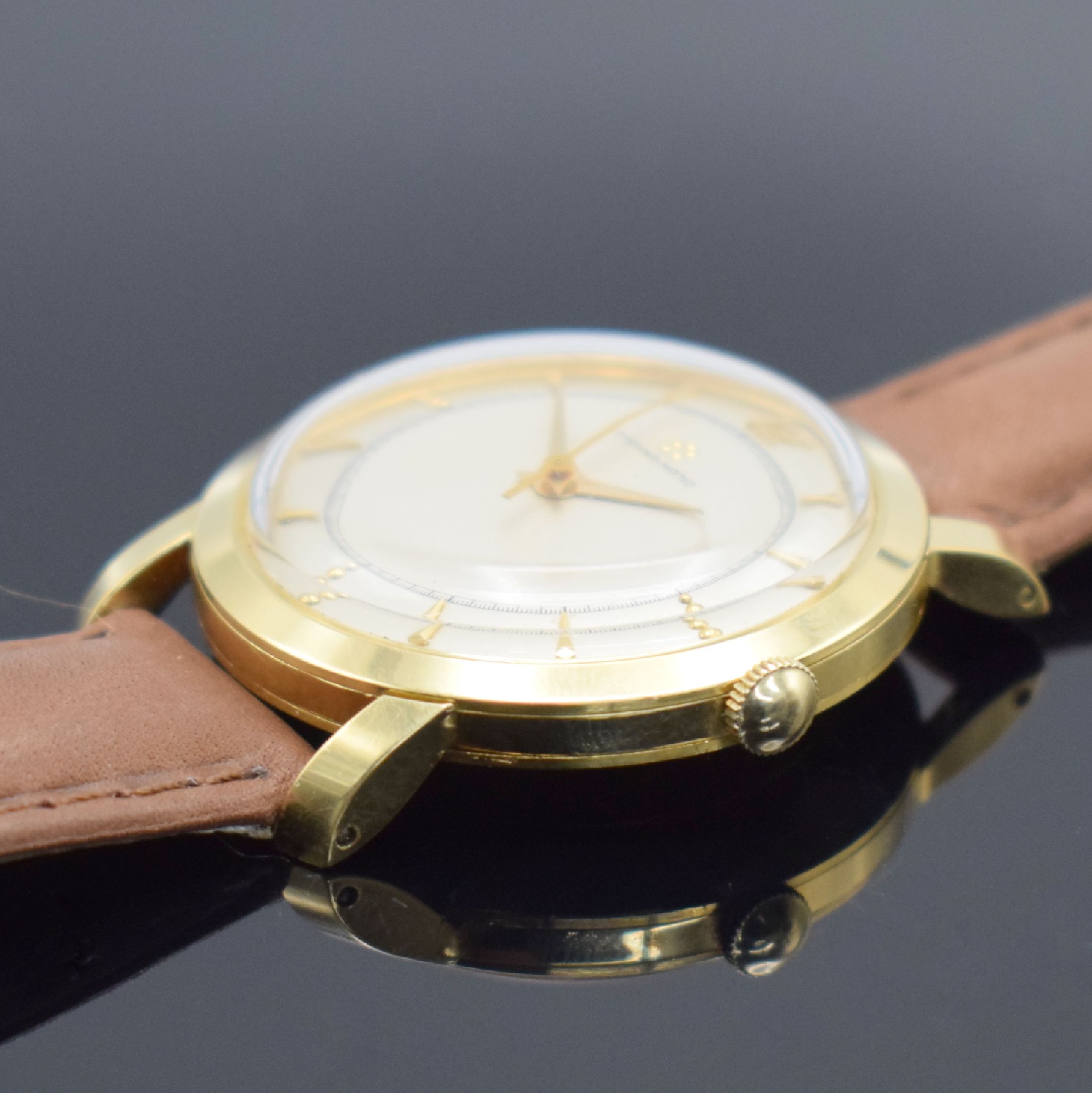 Detail b: ETERNA-MATIC Herrenarmbanduhr in GG 750/000, Schweiz um 1955, Automatik, 3-teil. Gehäuse, Boden & Glasrand aufgedr., silb. Duoton- Zifferbl. m. ...