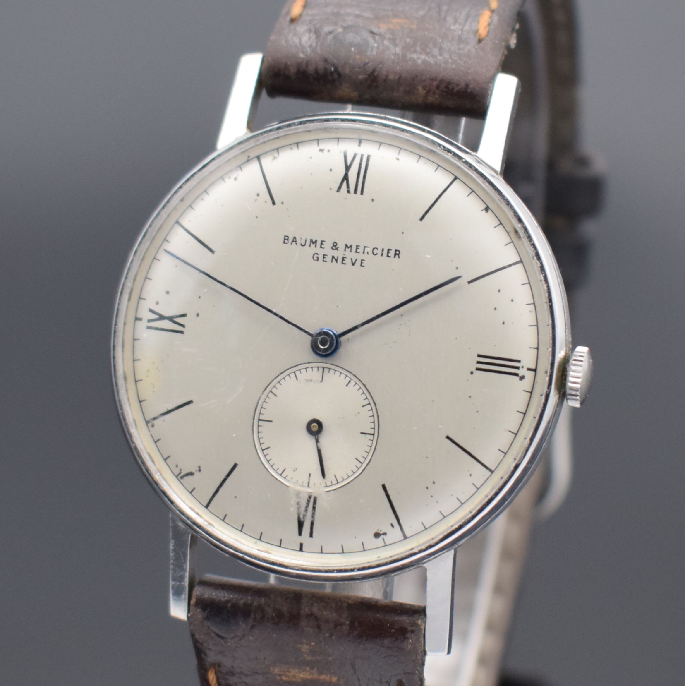 Detail g: GLYCINE & BAUME MERCIER 2 Herrenarmbanduhren in Stahl, Schweiz, 1) Baume & Mercier um 1940, Boden aufgedr., silb. Zifferbl. fl., gebl. Zeiger, Kal. ...
