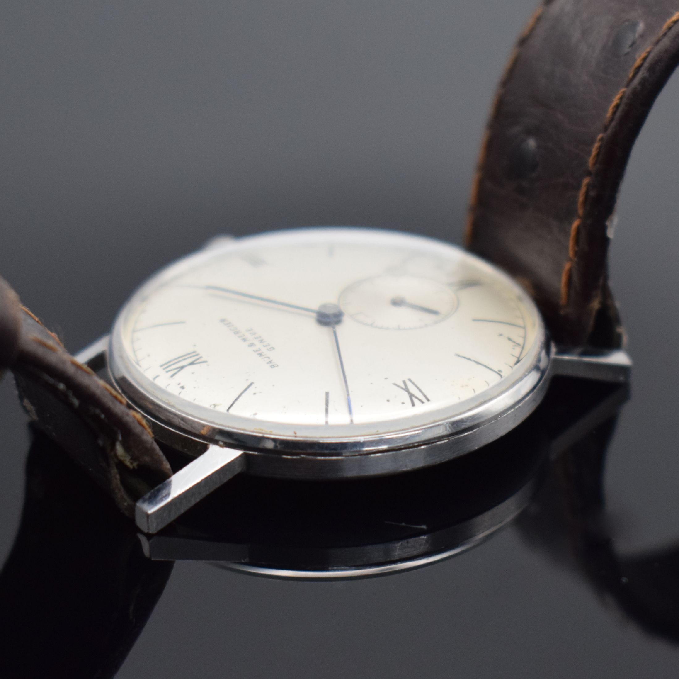 Detail h: GLYCINE & BAUME MERCIER 2 Herrenarmbanduhren in Stahl, Schweiz, 1) Baume & Mercier um 1940, Boden aufgedr., silb. Zifferbl. fl., gebl. Zeiger, Kal. ...