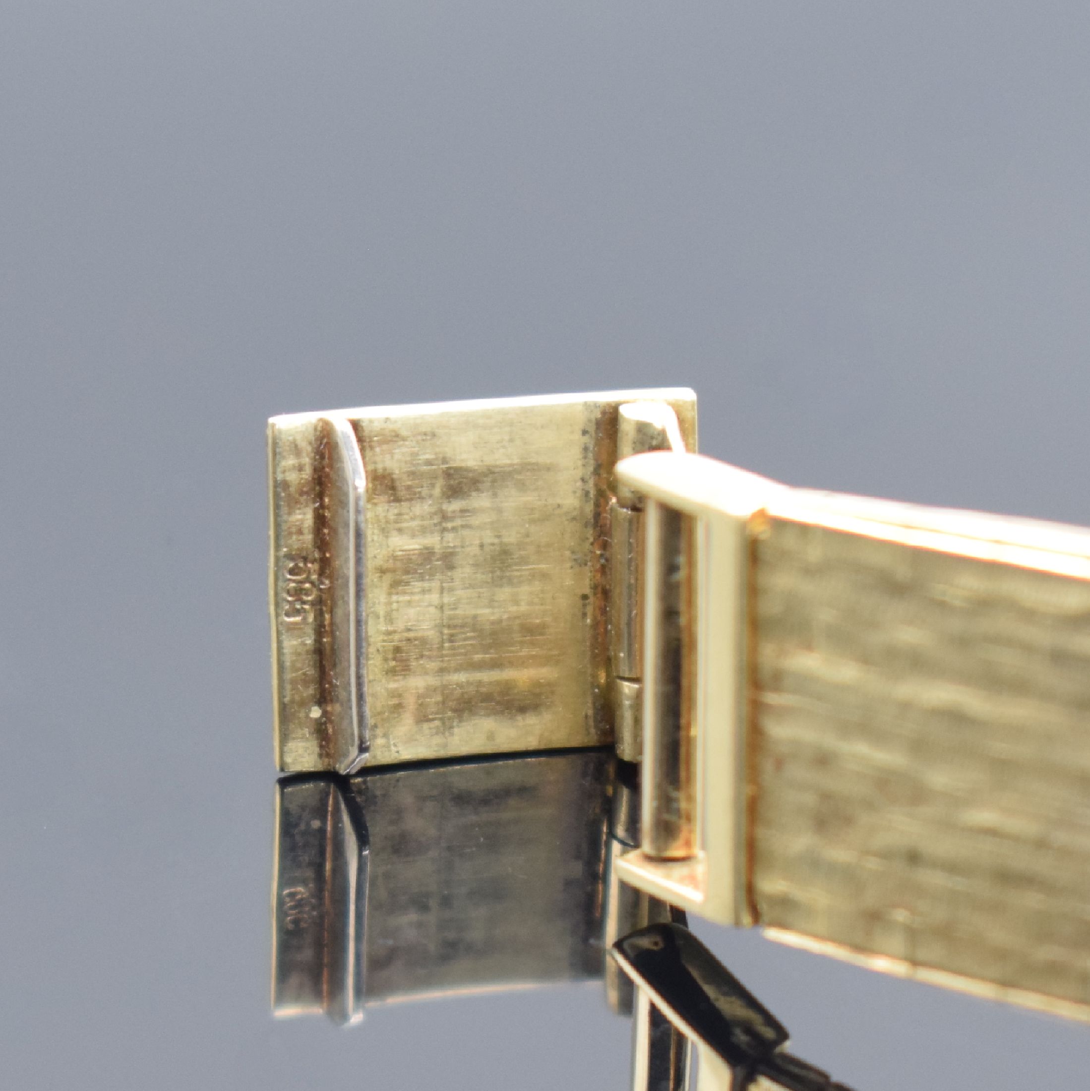 Detail b: PRONTO Herrengolduhr in GG 750/000 mit Band in GG 585/000, Schweiz um 1960, Handaufzug, 2 -teil. Geh., Boden aufgedr., neutr. Goldband später, silb. ...