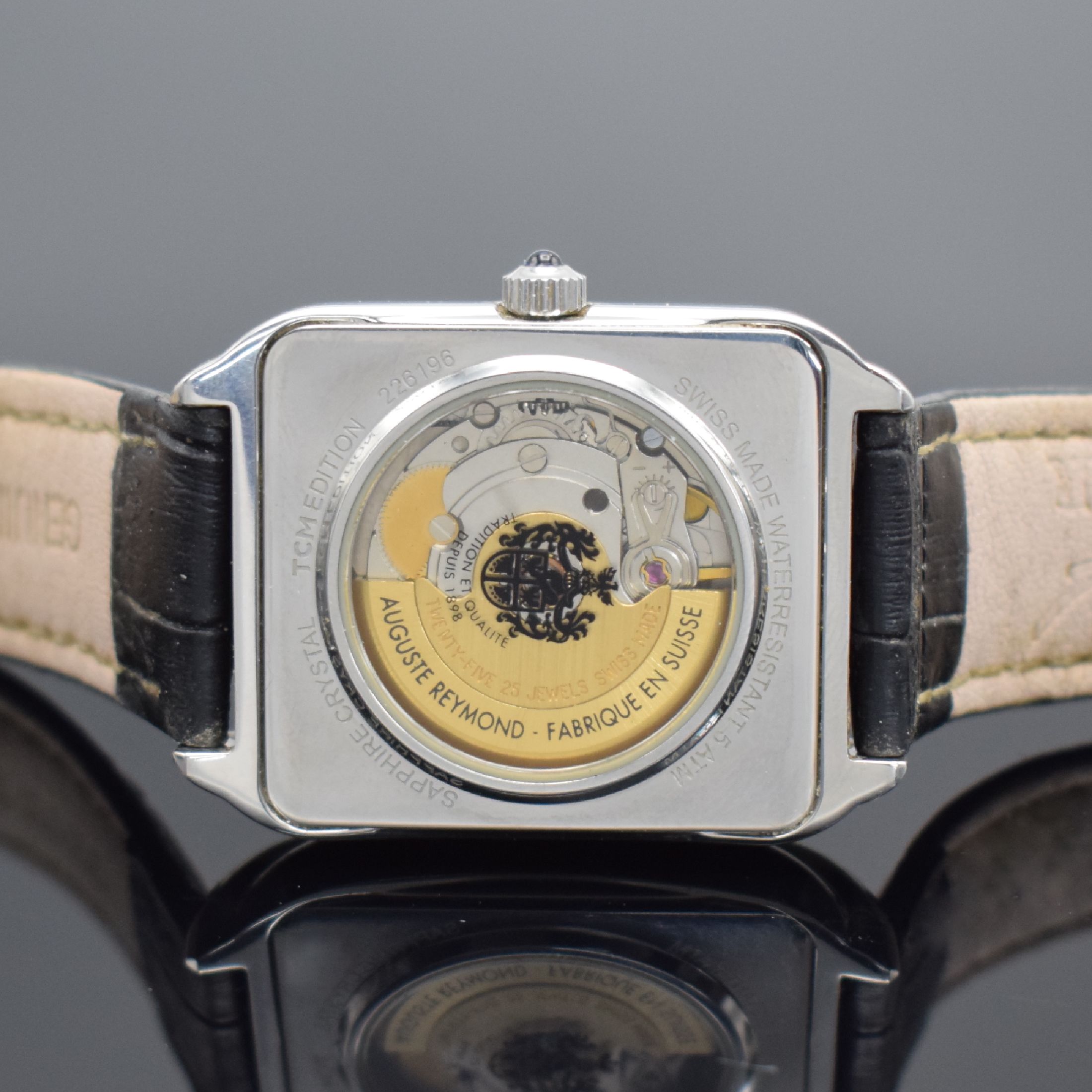 Detail c: AUGUSTE REYMOND Herrenarmbanduhr in Stahl, Schweiz um 2000, TCM-Edition, gestuftes Edel- stahlgeh. beids. vergl., Boden aufgedr., Schmuckkrone, silb. ...