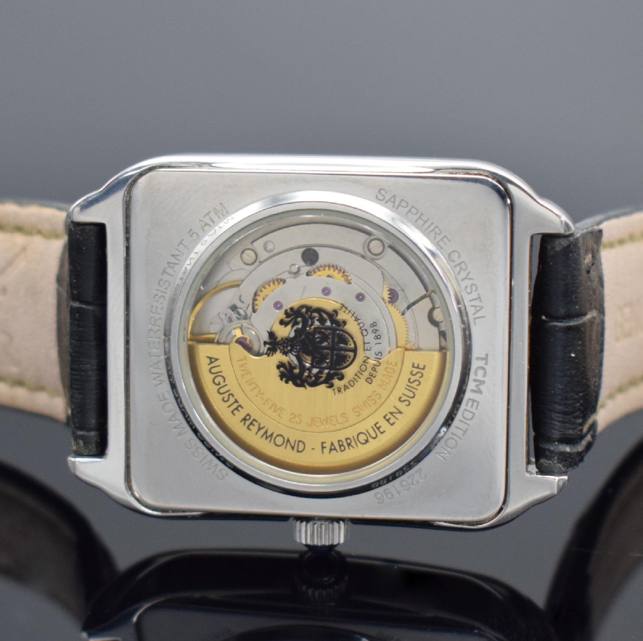 Detail d: AUGUSTE REYMOND Herrenarmbanduhr in Stahl, Schweiz um 2000, TCM-Edition, gestuftes Edel- stahlgeh. beids. vergl., Boden aufgedr., Schmuckkrone, silb. ...