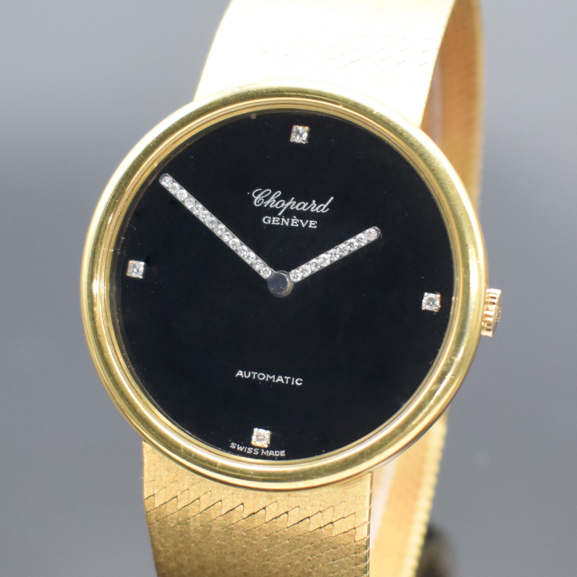 Detail a: CHOPARD Armbanduhr in GG 750/000, Automatik, Schweiz um 1980, 2-teil. Geh. inkl. Milanaiseband, Boden aufgedr., schwarzes Zifferbl. m. 4 aufgel. ...