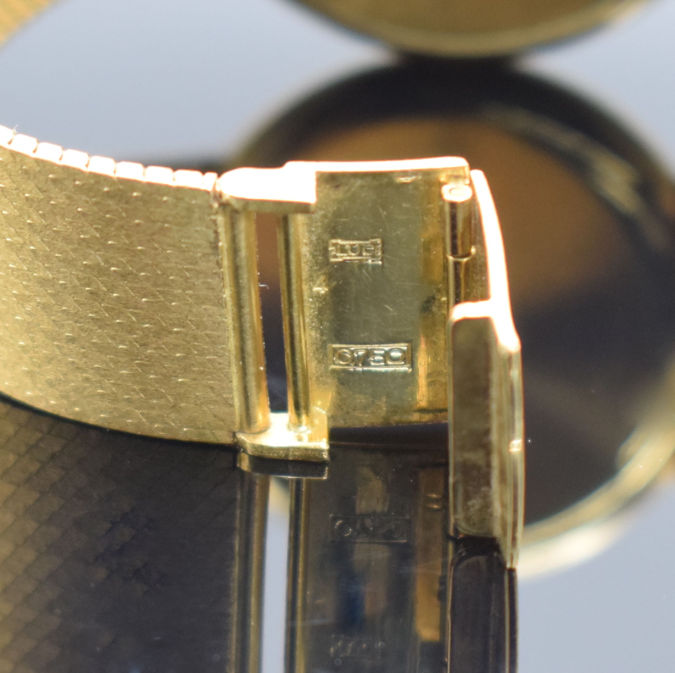 Detail b: CHOPARD Armbanduhr in GG 750/000, Automatik, Schweiz um 1980, 2-teil. Geh. inkl. Milanaiseband, Boden aufgedr., schwarzes Zifferbl. m. 4 aufgel. ...