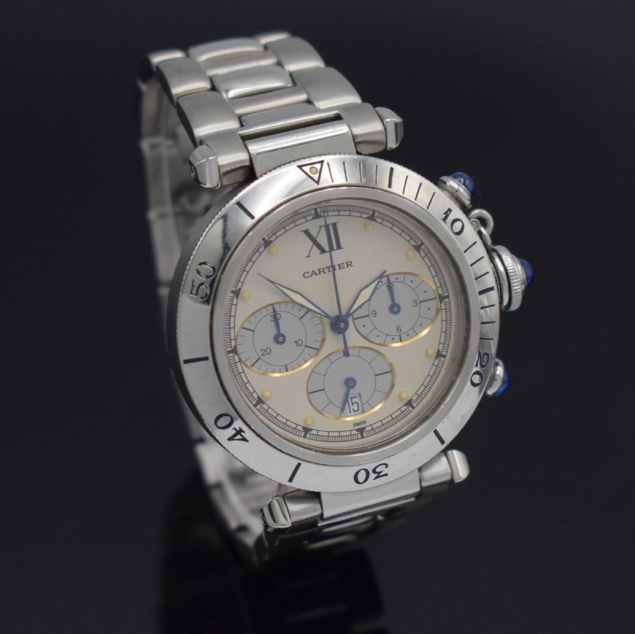 Detail d: CARTIER Armbandchronograph Pasha, Schweiz um 1995, quarz, Edelstahlgeh., Boden verschr., eins. drehb. Lünette, Gliederband m. dopp. Faltschl., silb. ...