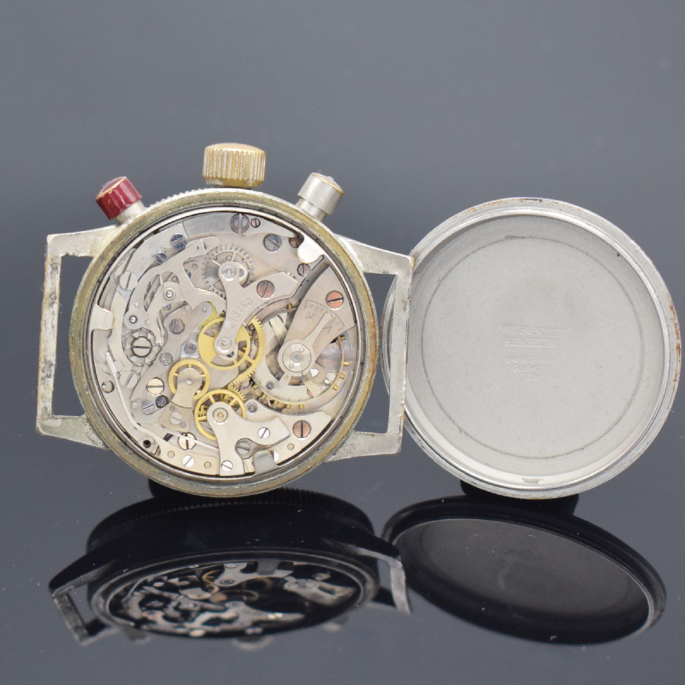 Detail d: TUTIMA GLASHÜTTE UROFA 59 Flyback- Schaltradchronograph, Deutschland um 1940, vernickeltes Gehäuse m. Drehlünette, Edelstahlboden verschr., orig. ...