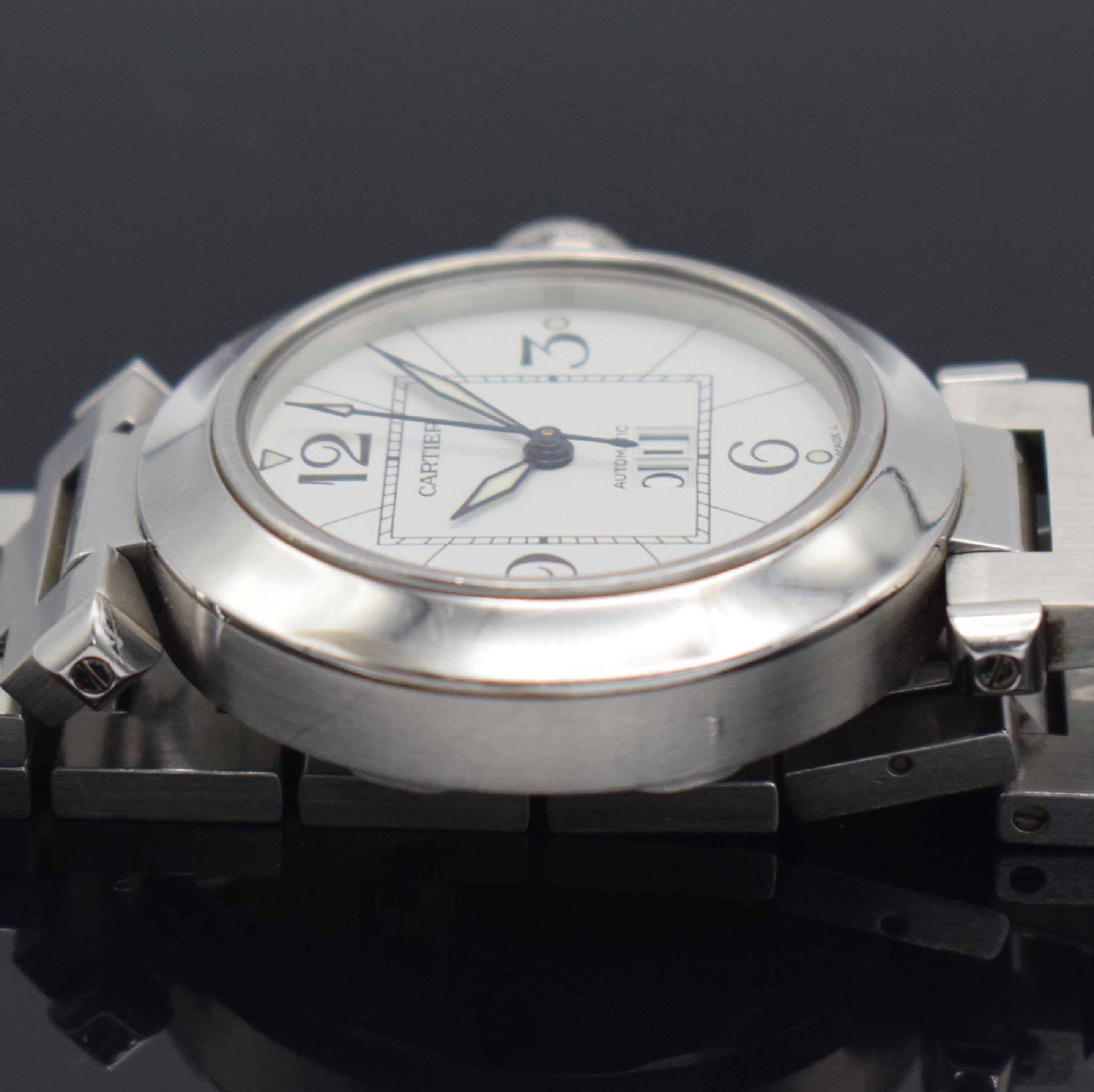 Detail e: CARTIER Pasha C Armbanduhr Referenz 2475 in Stahl, Schweiz um 2003, Automatik, 8-fach verschr. Geh., integr. orig. Stahlband m. dopp. Faltschl., ...
