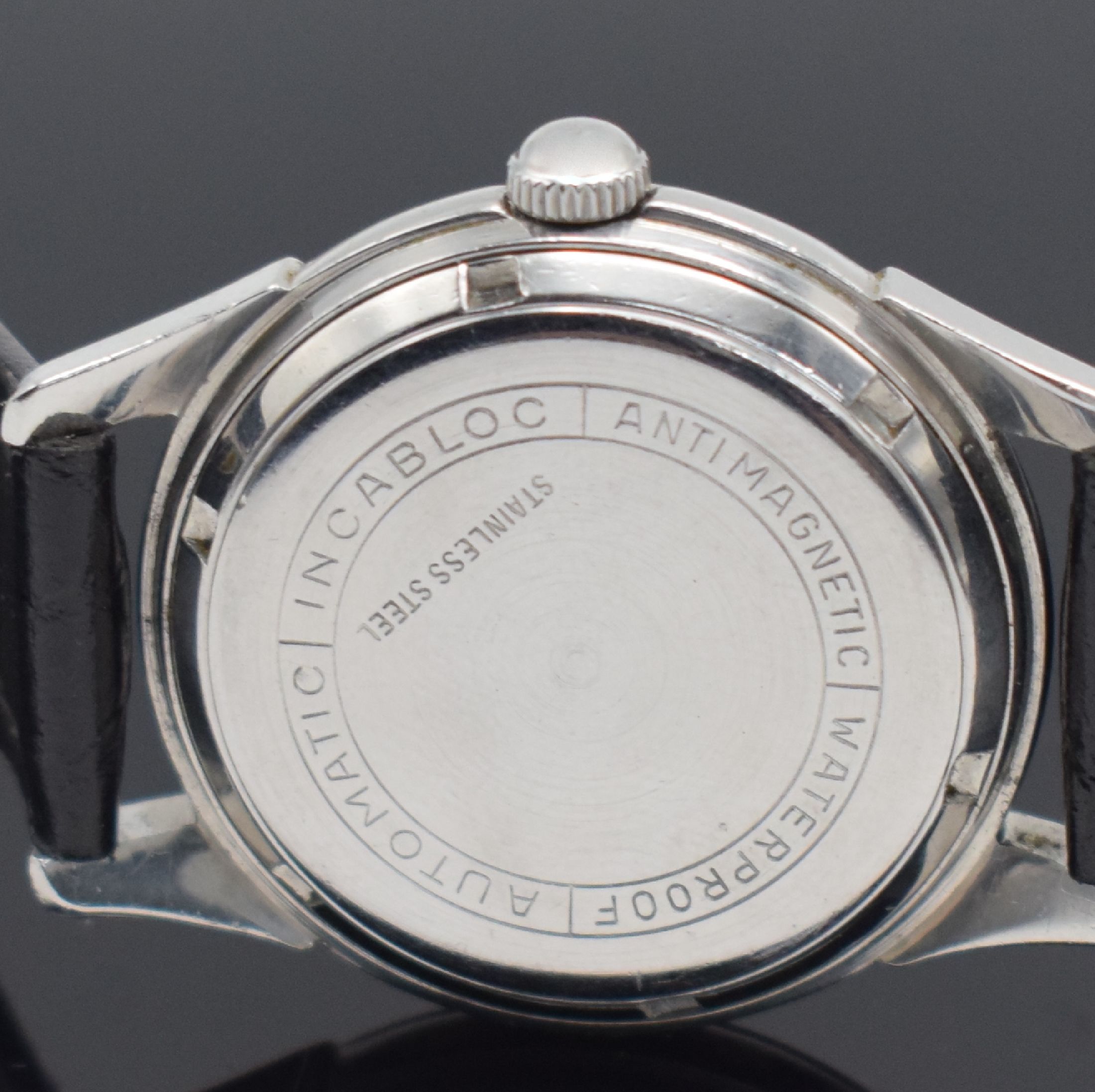 Detail e: PIAGET Automatik Armbanduhr in Stahl, Schweiz um 1955, Automatik, 3-teil. Gehäuse, Boden geschr., Lünette gedr., silb. Zifferbl. pat., aufges. ...