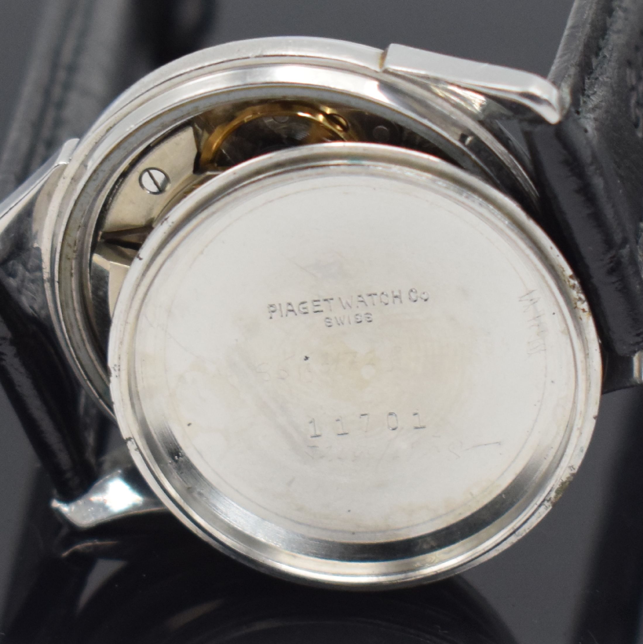 Detail h: PIAGET Automatik Armbanduhr in Stahl, Schweiz um 1955, Automatik, 3-teil. Gehäuse, Boden geschr., Lünette gedr., silb. Zifferbl. pat., aufges. ...